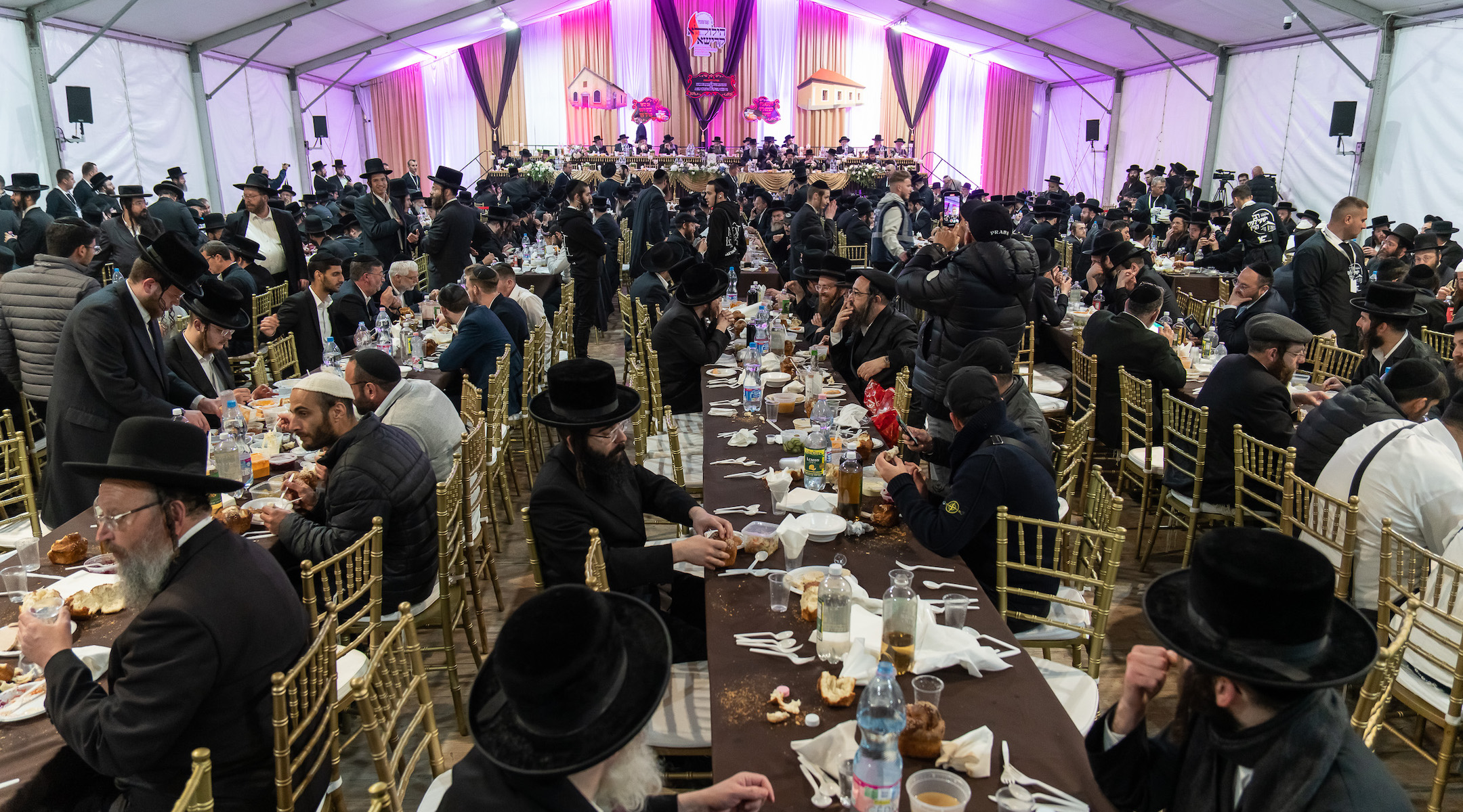 Orthodox Jews gather for a meal in Bodrogkeresztur, Hungary, during an annual pilgrimage to the town that was the home of Rabbi Yeshaya Steiner, also known as Rabbi Shayele. (Barnabas Horvath)