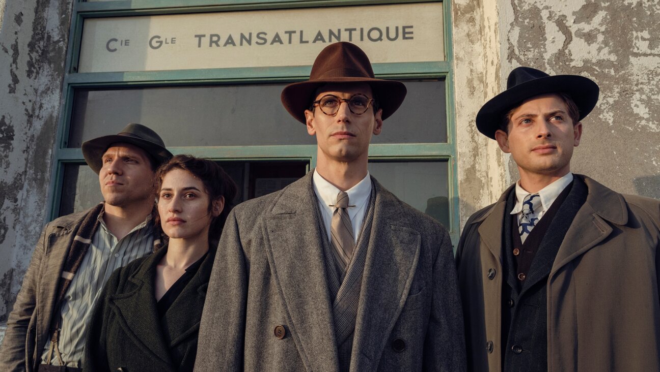 Hanno Koffler as Hans Fittko, Deleila Piasko as Lisa Fittko, Cory Michael Smith as Varian Fry and Amit Rahav as Thomas Lovegrove in “Transatlantic.” (Anika Molnar/Netflix)