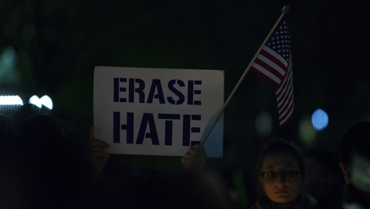 "Erase Hate" sign at a 2018 vigil in Washington, D.C., for the victims of Pittsburgh's Tree of Life Congregation shooting.  