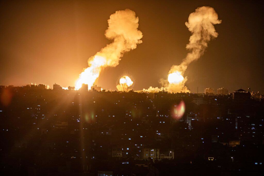 This picture taken early on April 7, 2023 shows explosions in Khan Yunis in the southern Gaza Strip during Israeli air strikes on the Palestinian enclave.