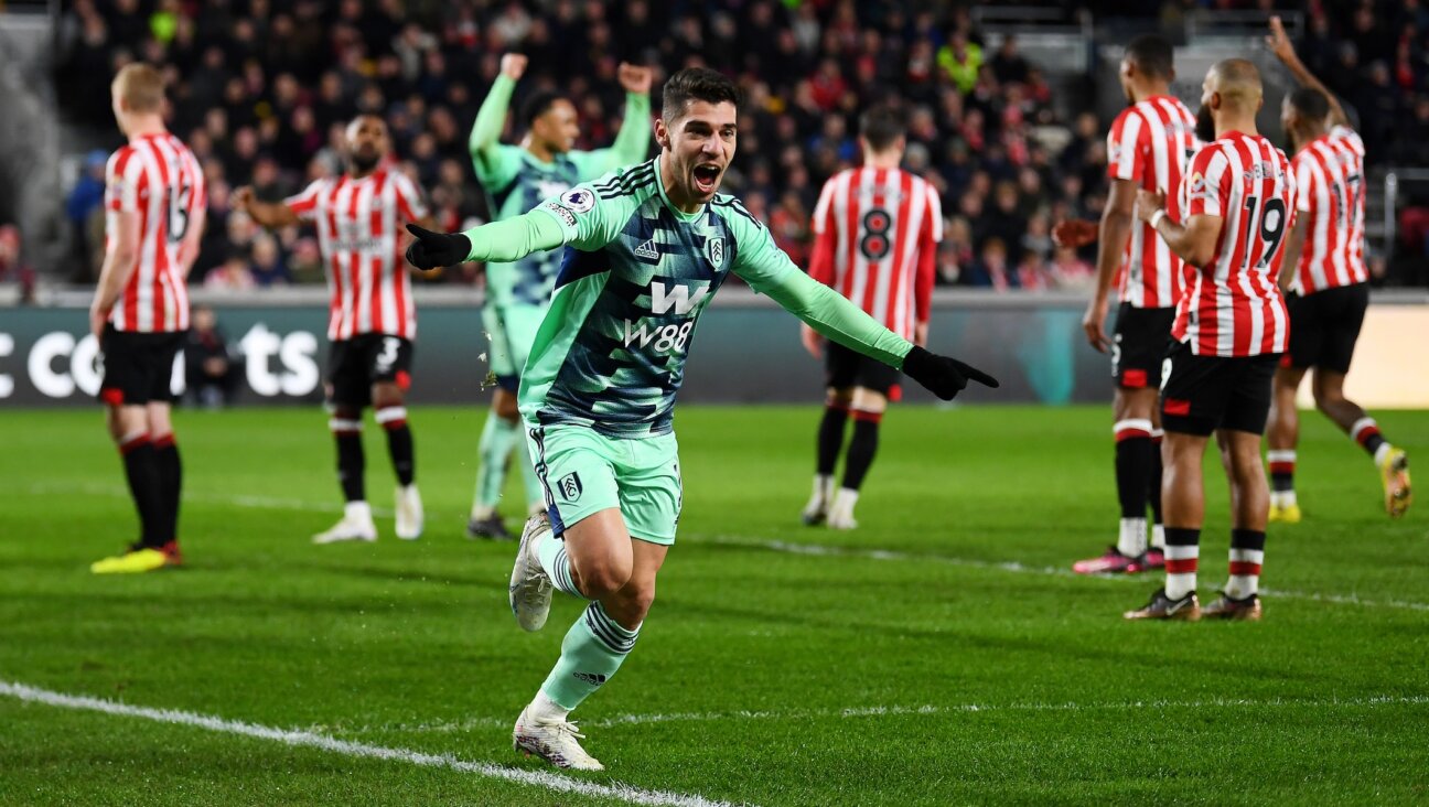 Manor Solomon celebrates after scoring a goal during the Premier League match between Brentford FC and Fulham FC, March 6, 2023. (Alex Davidson/Getty Images)