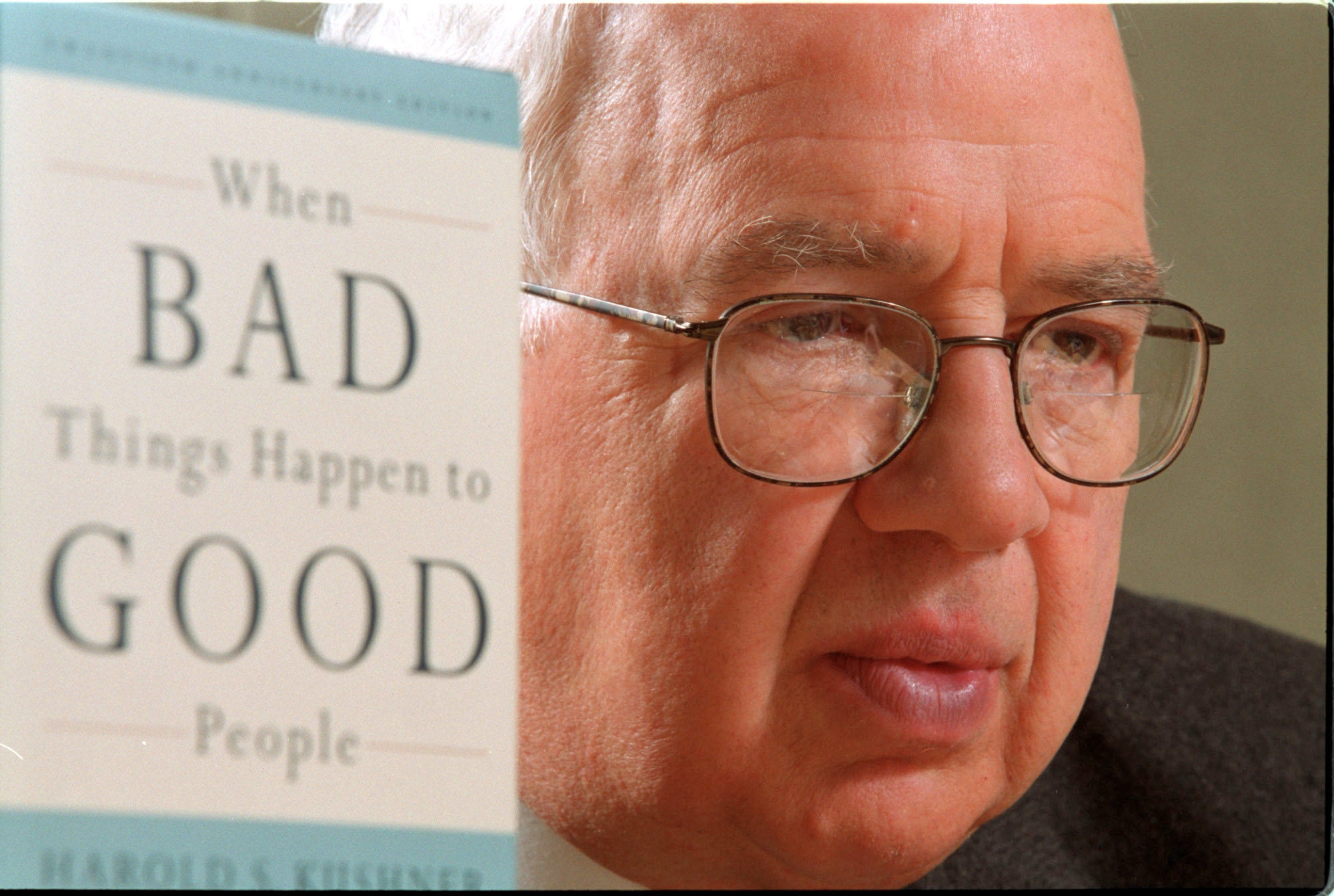 Author and Rabbi Harold Kushner is pictured with his best-selling book, “When Bad Things Happen to Good People,” in 2001. (Ron Bull/Toronto Star via Getty Images)