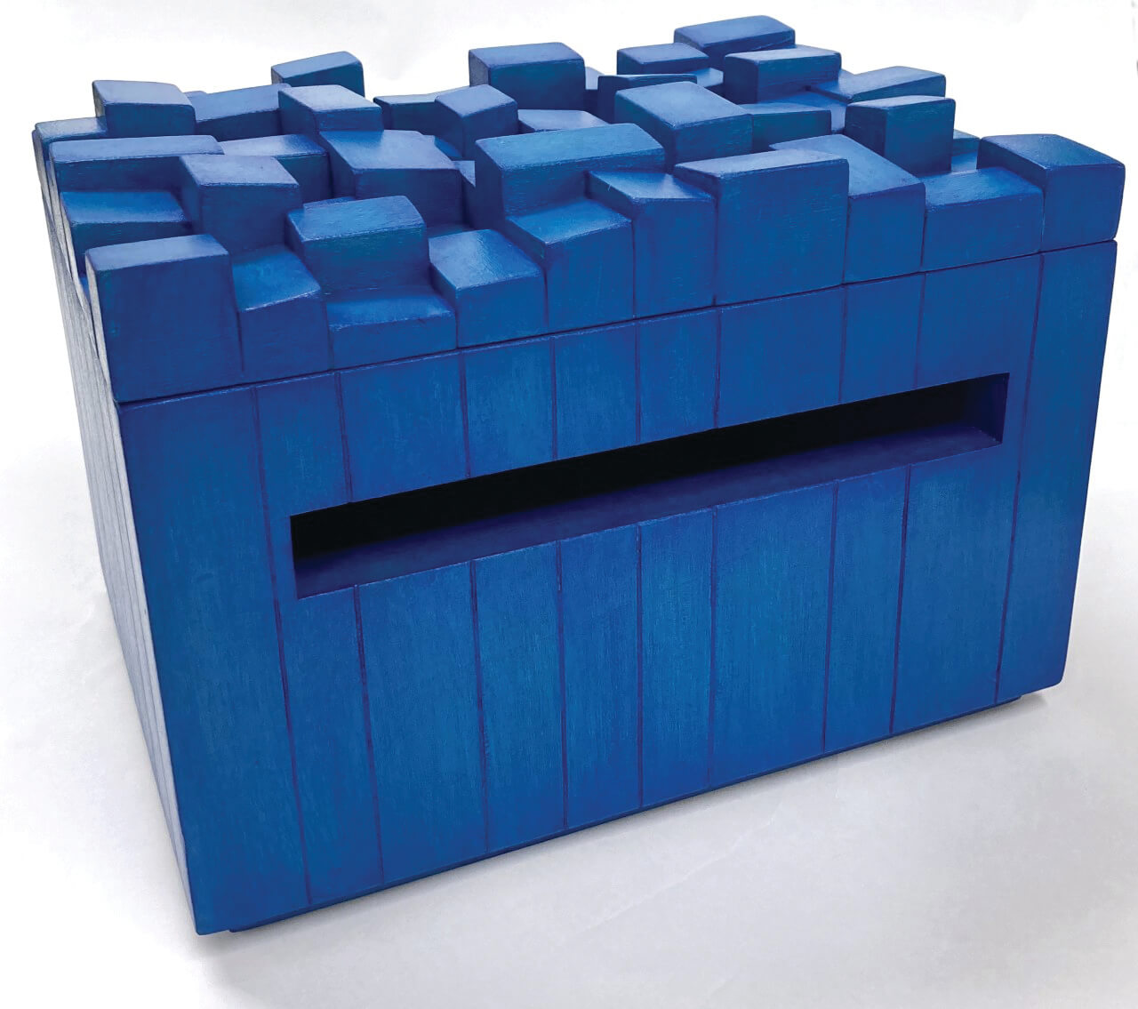 Tobi Kahn was the first artist approached to make a tzedek box.