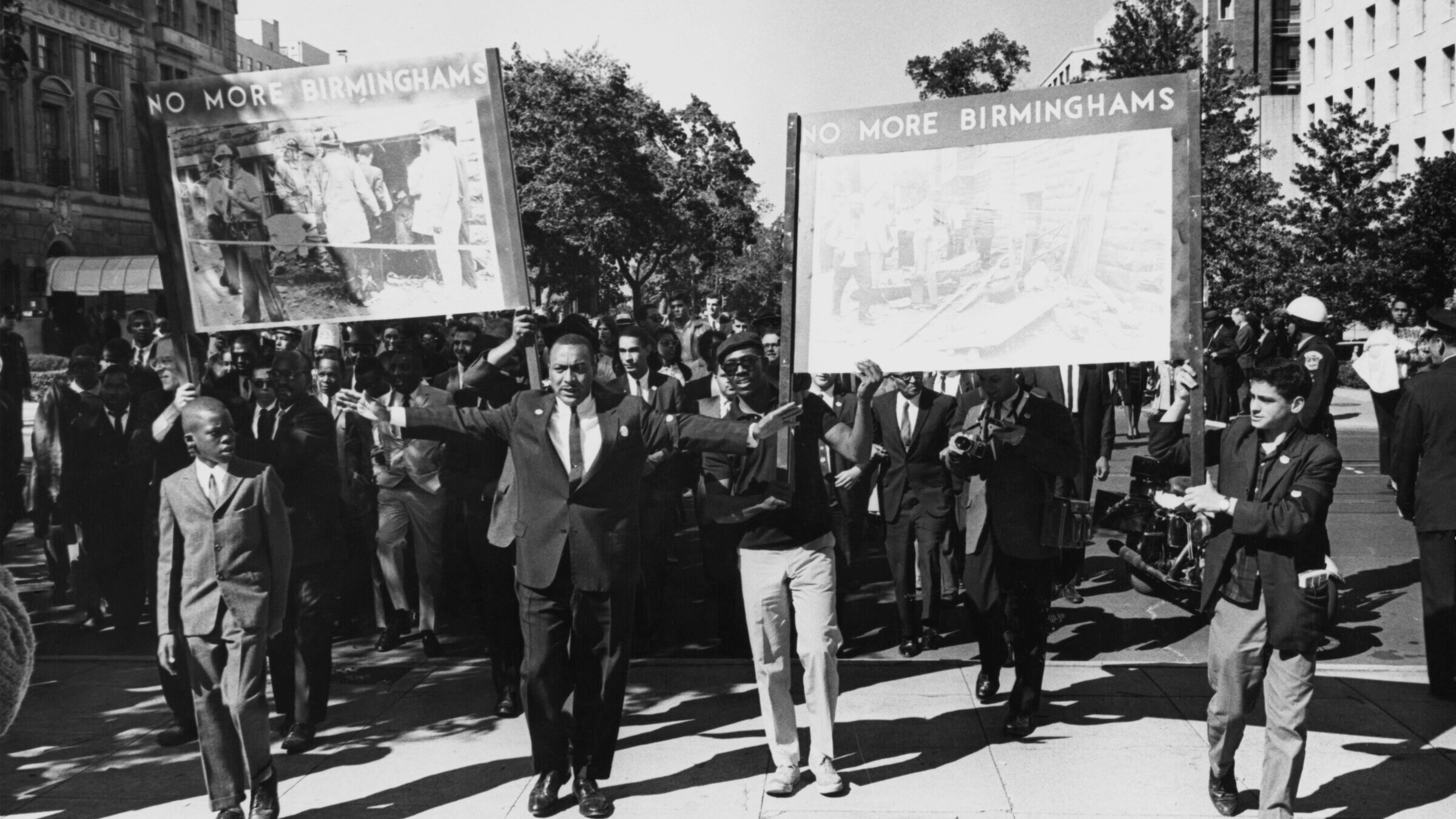 People at a civil rights demonstration holding posters reading 'No More Birminghams', in reference to the bombing of the 16th Street Baptist Church (in Birmingham, Alabama), Washington D.C., Sept. 22. 1963. The bombing had been carried out by white supremacists several days earlier, on Sept. 15.