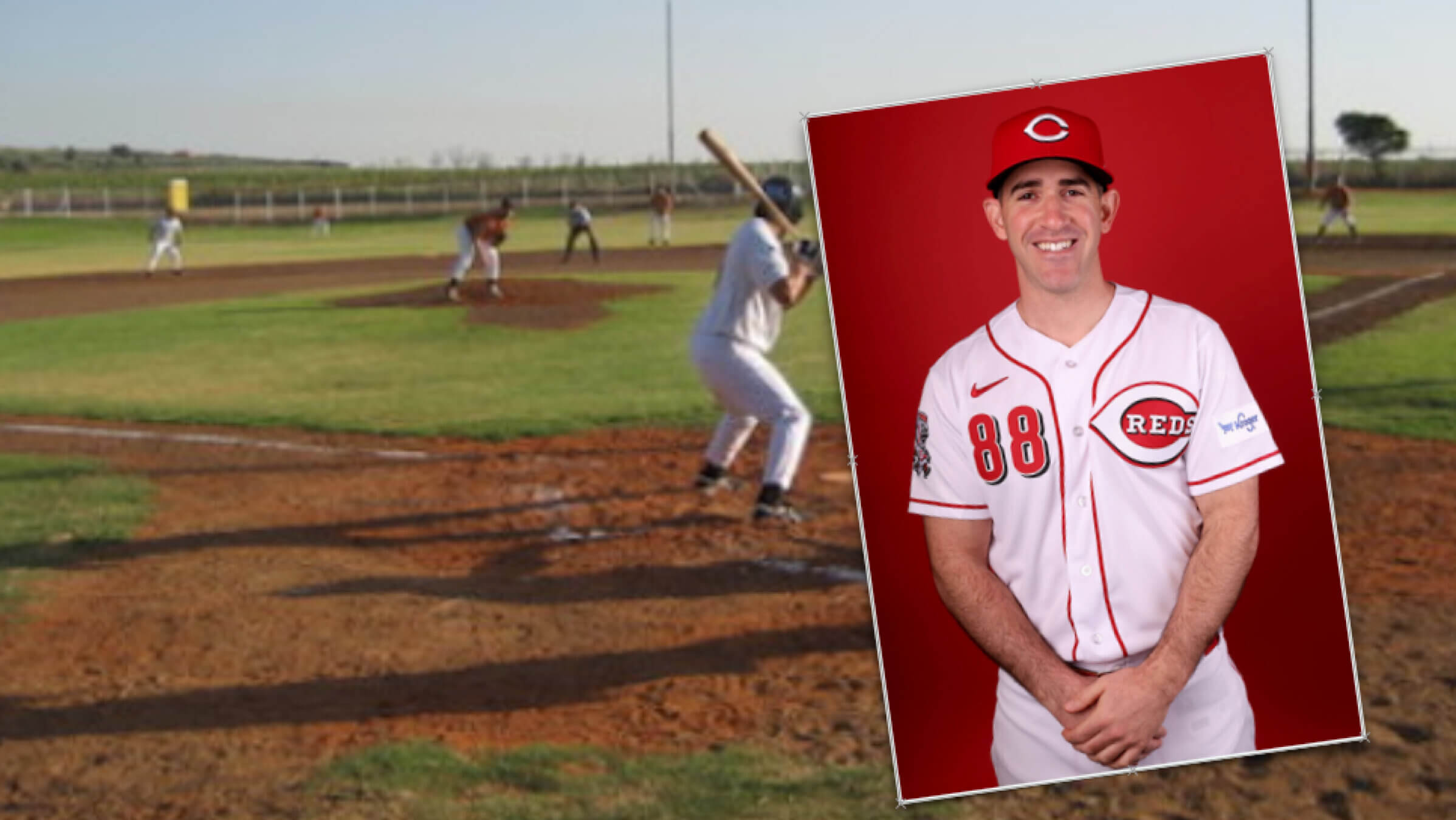 Alon Leichman, a new assistant coach for the Cincinnati Reds. Background is the baseball field on which he learned to play, the first in Israel, on Kibbutz Gezer.