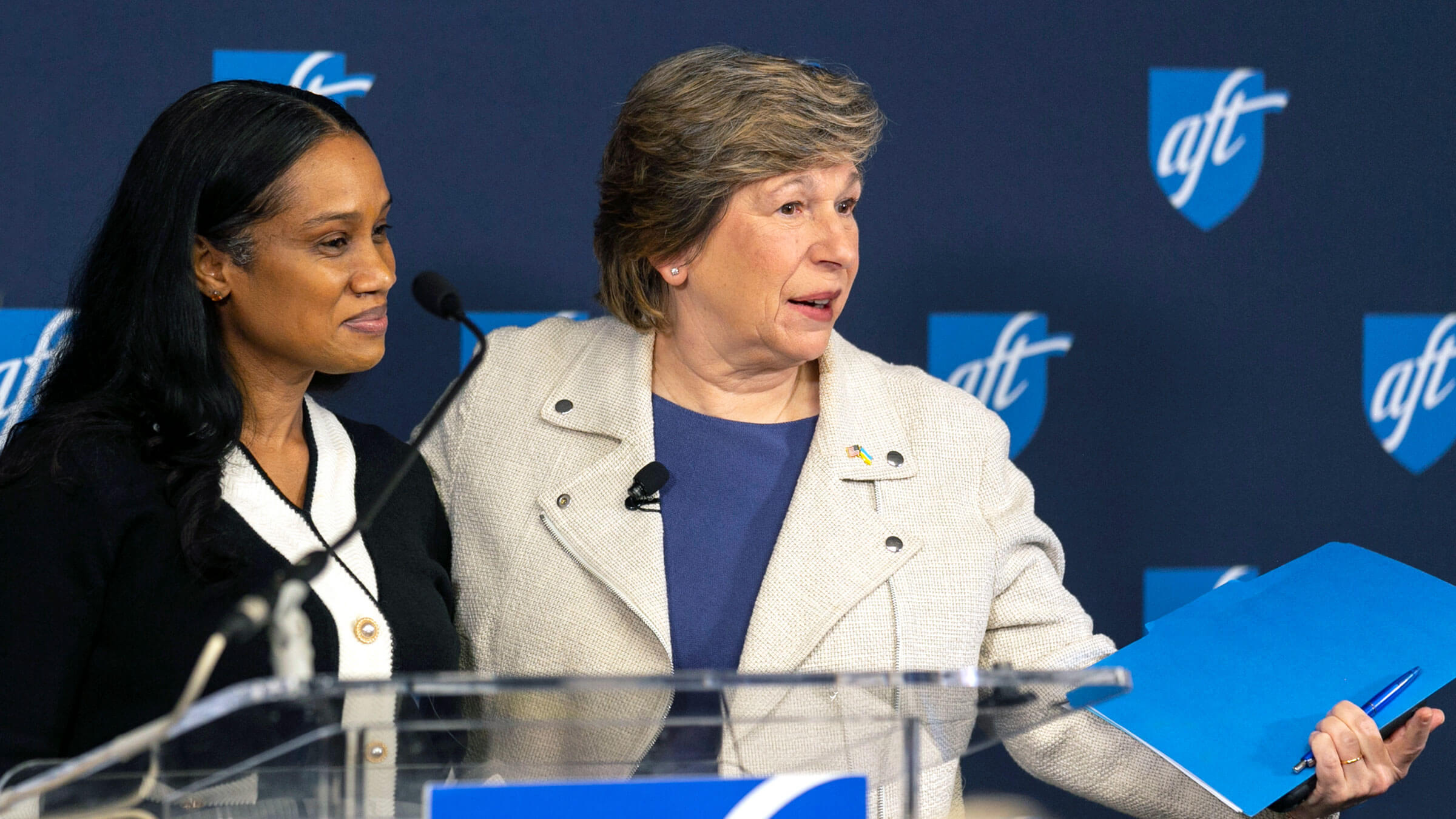 Weingarten, right, with her former student Tamara Simpson, a New York City public school teacher, at the National Press Club on March 28.
