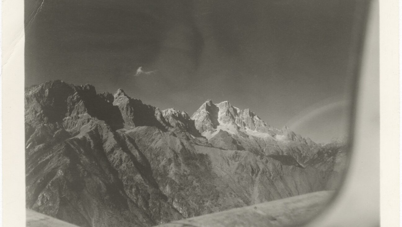 The view from a C-47 transport plane flying over the Himalayas,