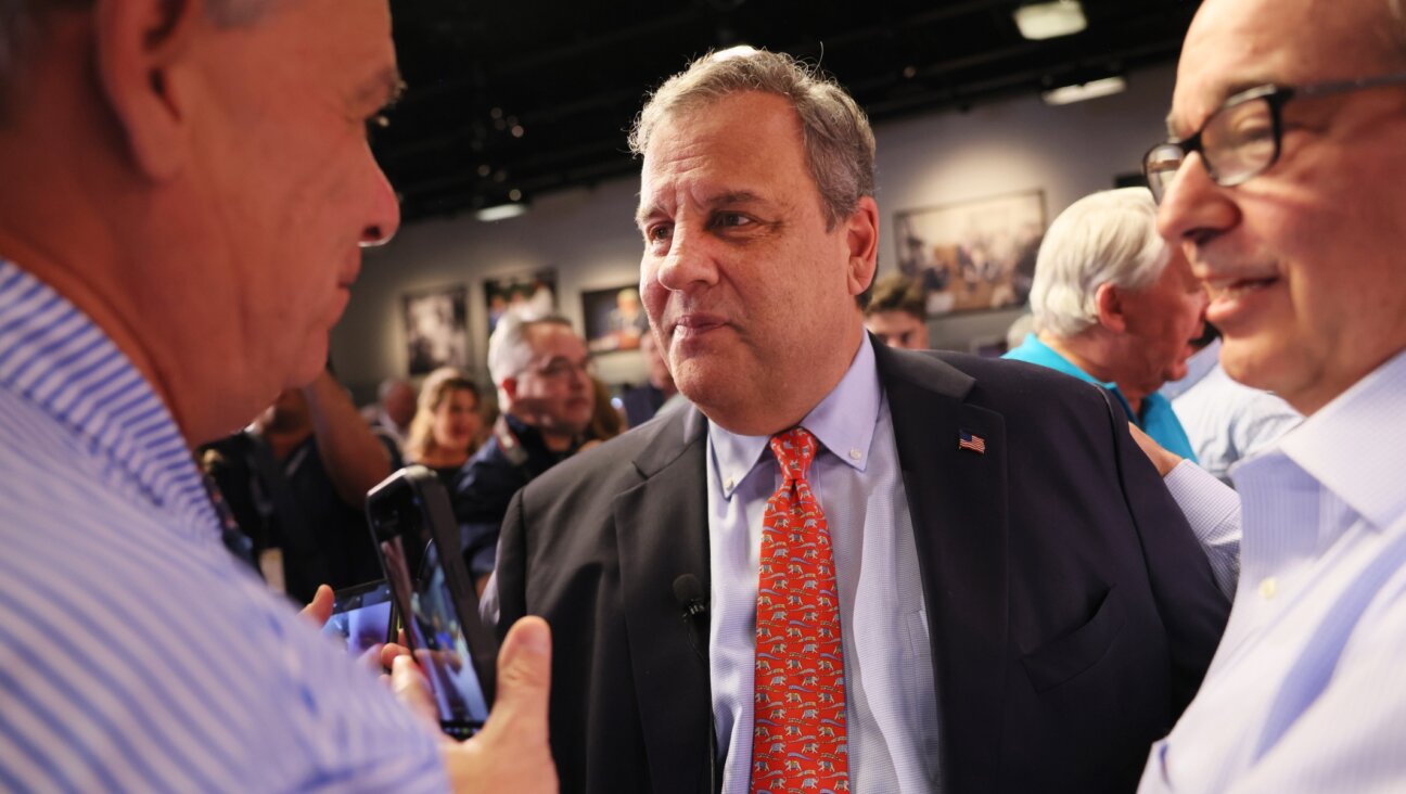 Former New Jersey Gov. Chris Christie talks to supporters at a town-hall-style event at the New Hampshire Institute of Politics at Saint Anselm College, in Manchester, New Hampshire, June 6, 2023. (Michael M. Santiago/Getty Images)