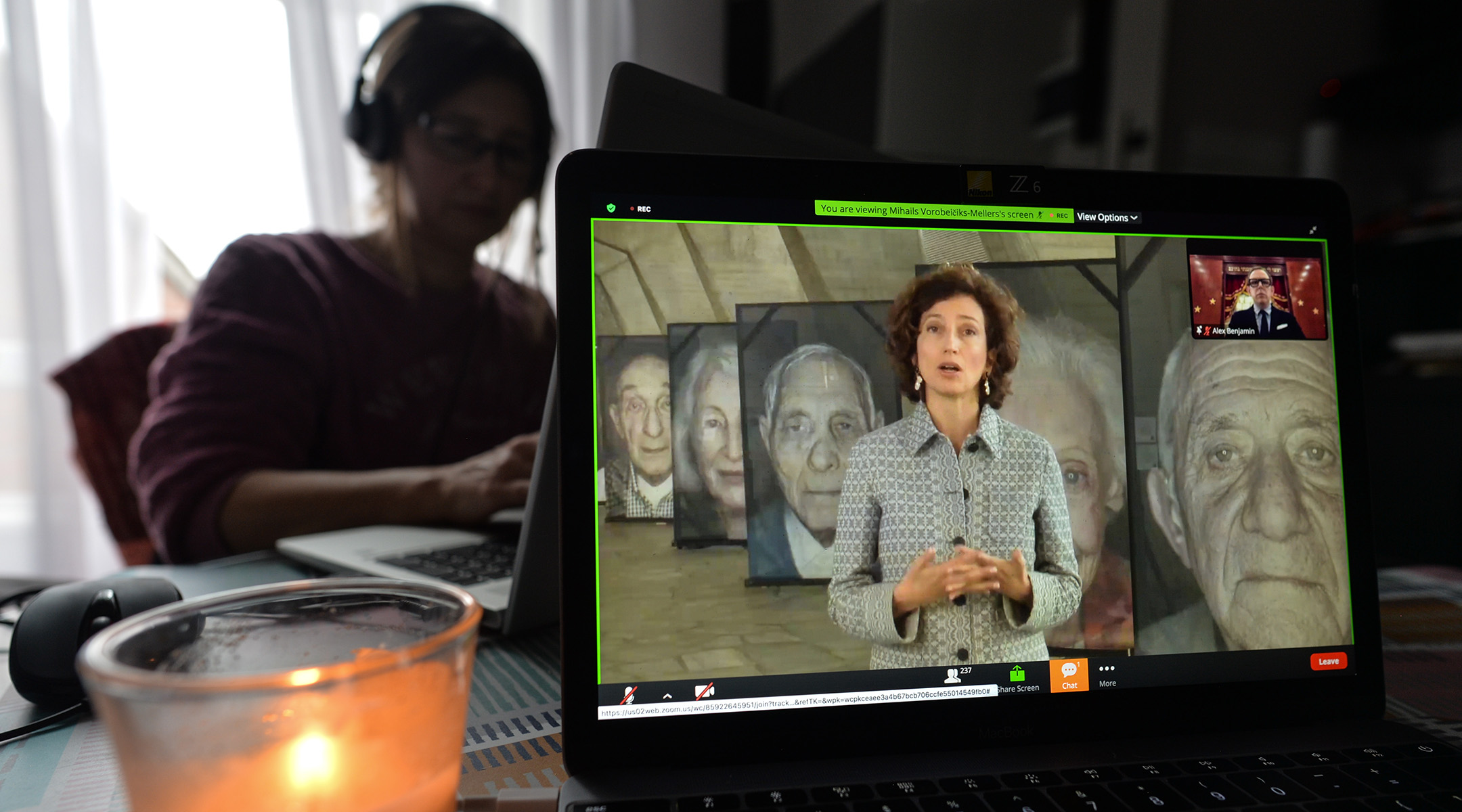 A woman watches Audrey Azoulay, UNESCO’s director-general, speak during an online commemoration on International Holocaust Remembrance Day in Dublin, Jan. 27, 2021. (Artur Widak/NurPhoto via Getty Images)