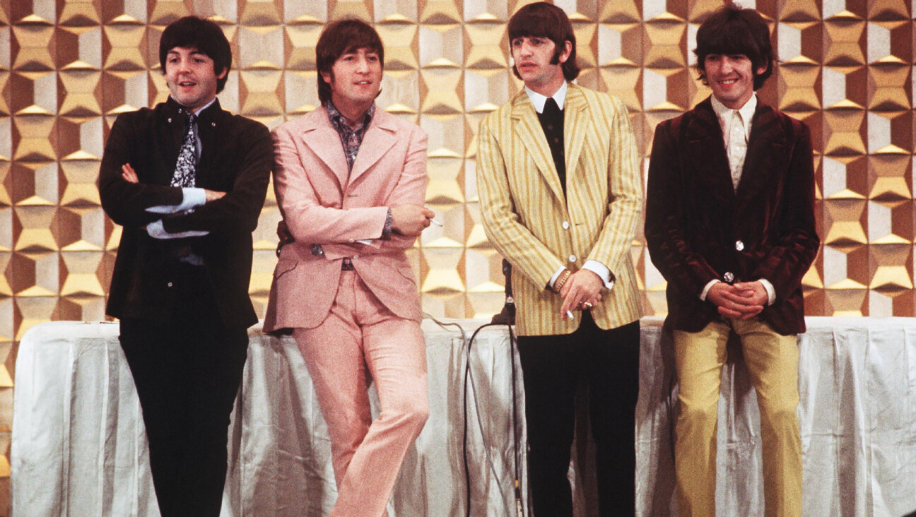 The Beatles, circa 1966, the same year they released the song "Eleanor Rigby."