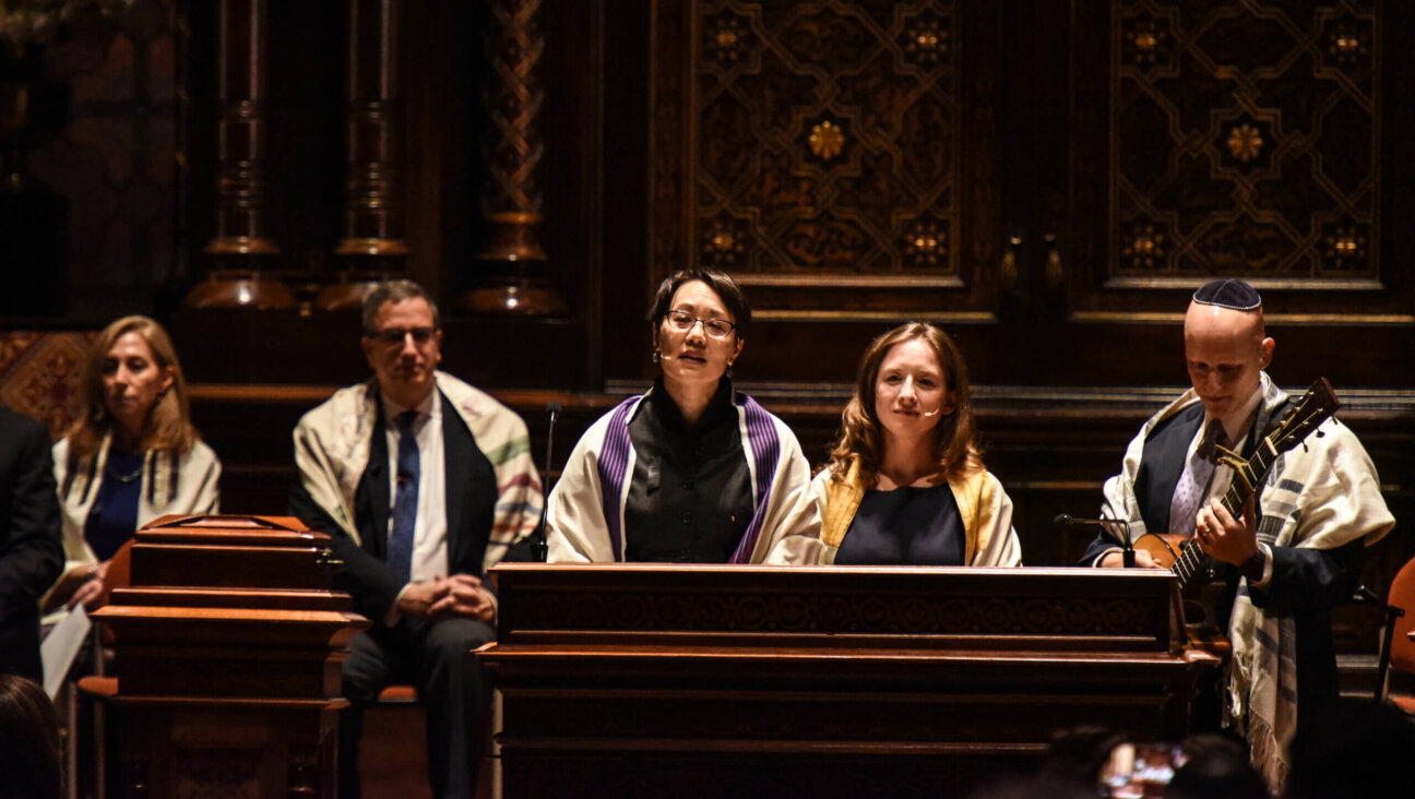 Rabbi Angela Buchdahl (center) speaks at New York's Central Synagogue in 2018. 