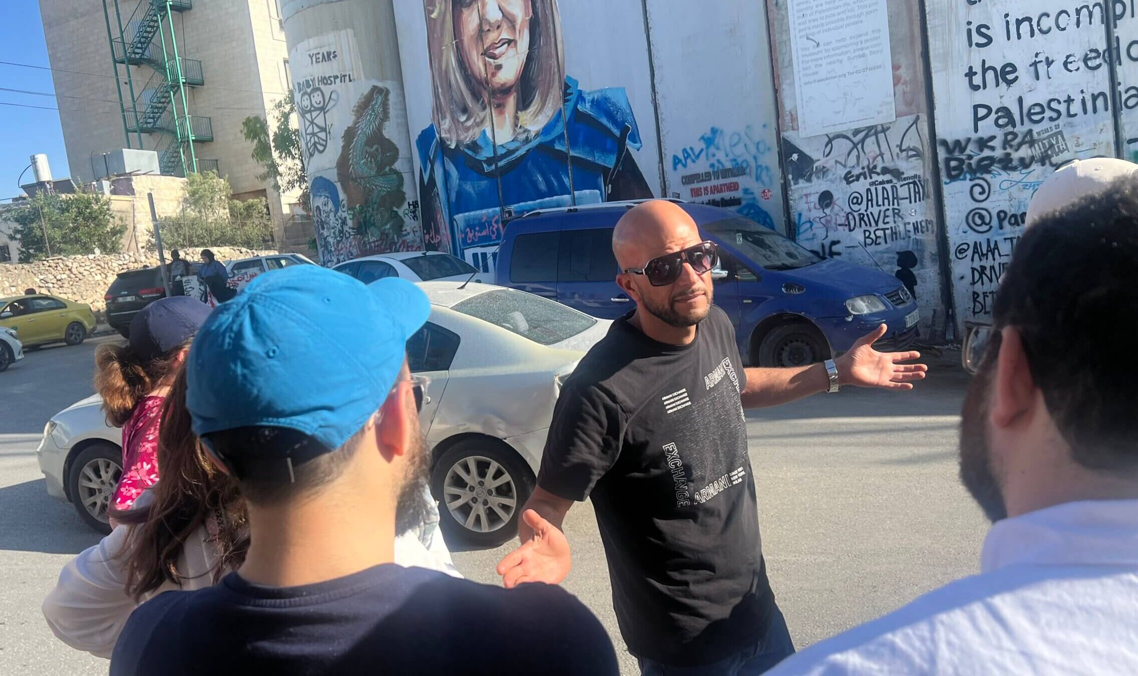 Palestinian journalist and tour guide Rami Nazzal gives American rabbinical students a tour of Bethlehem in the Israeli-occupied West Bank. A new program from Sinai Temple in Los Angeles is intended to help future rabbis learn how to have difficult conversations about Israel and Zionism.