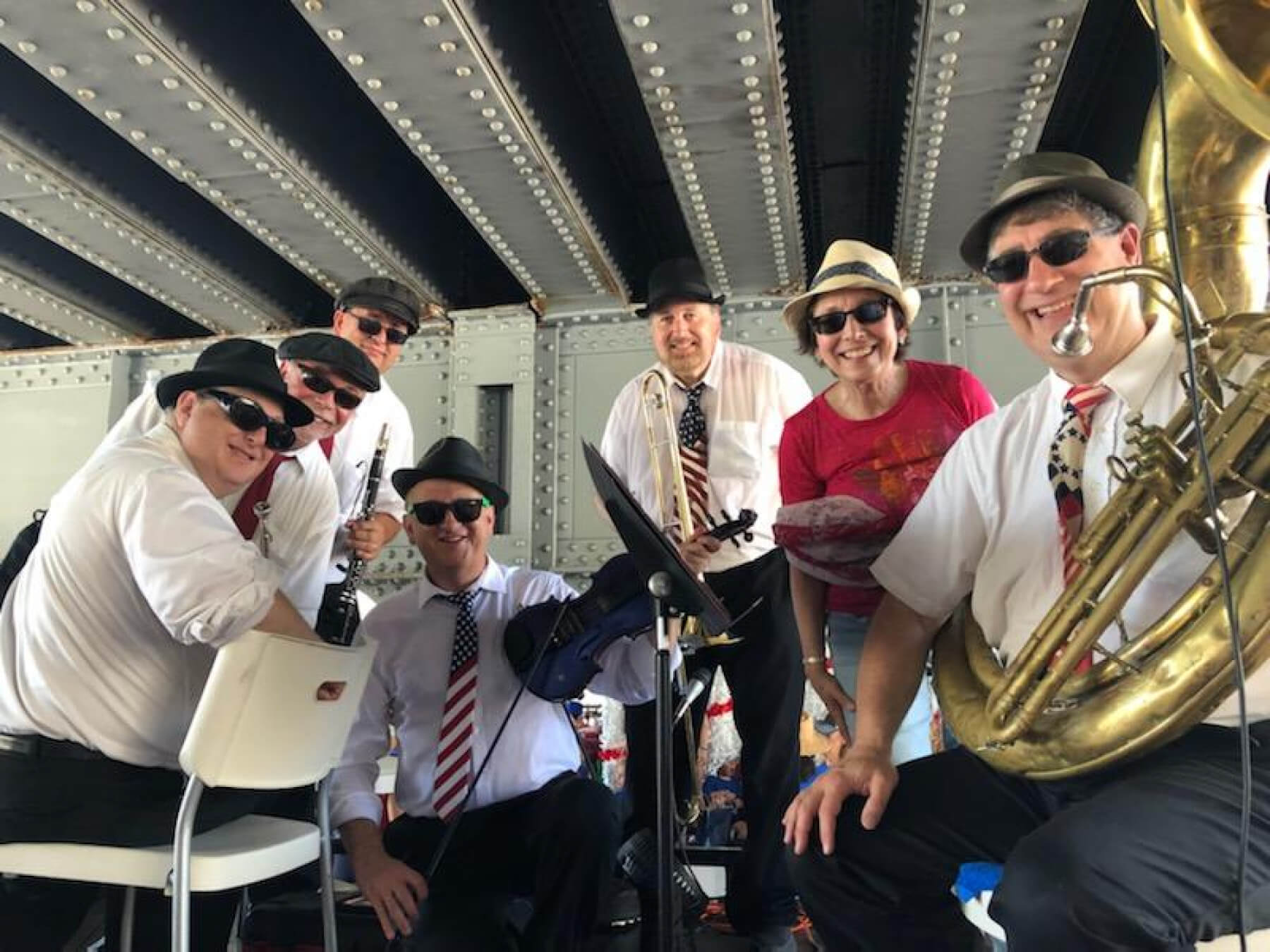 The Maxwell Street Klezmer band under a bridge at the Highland Park July 4 parade in 2019.