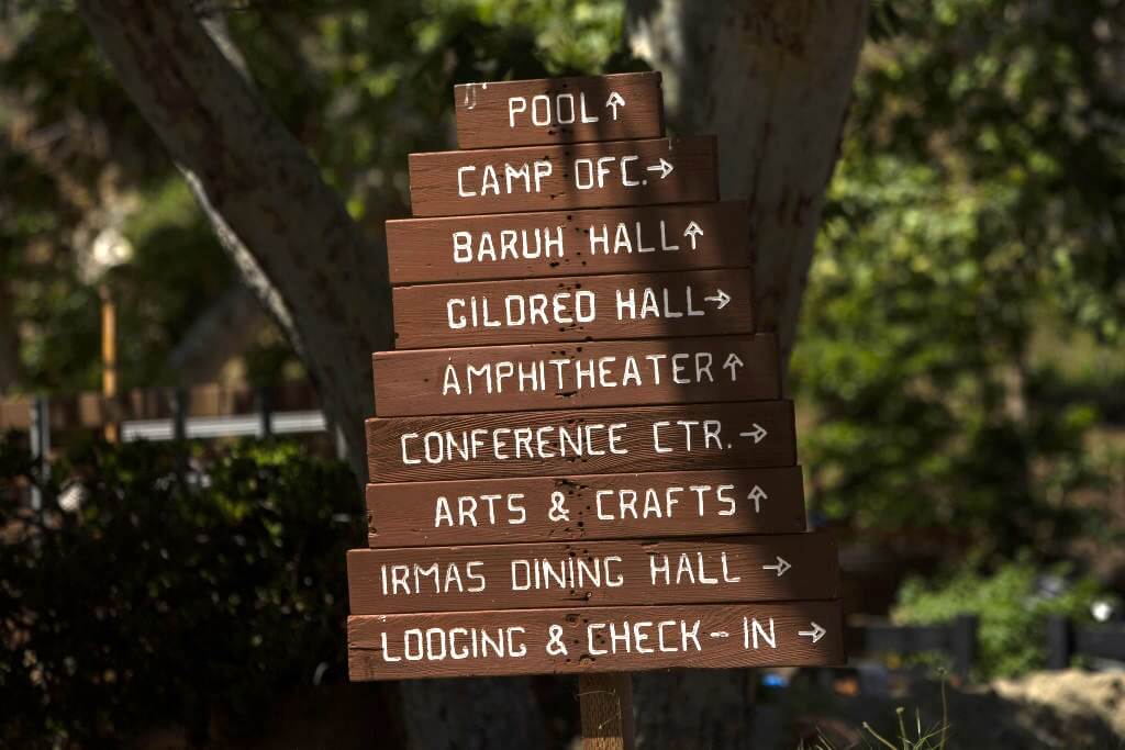 Directional signs at Camp Hess Kramer in California.