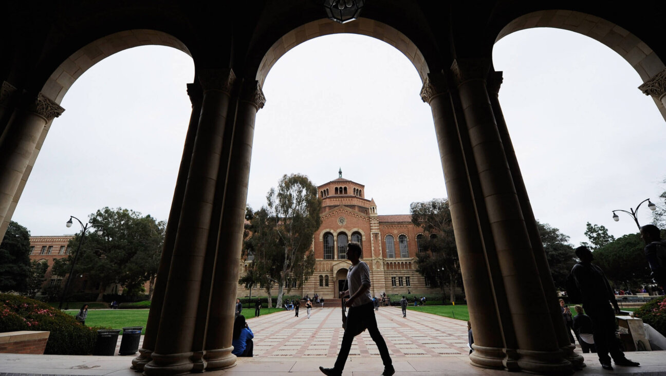 A student walks near Royce Hall on the campus of UCLA on April 23, 2012 in Los Angeles, California. 
