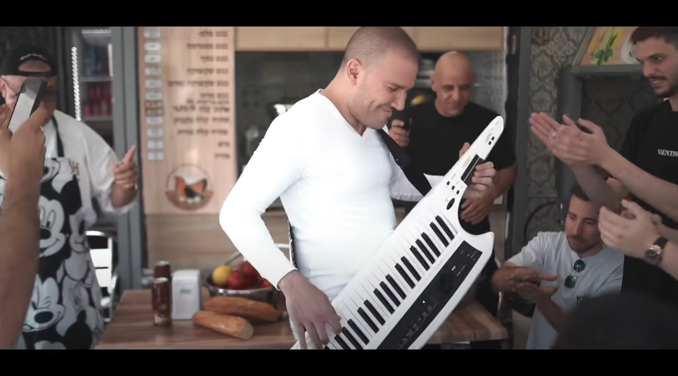 Performers dance in the video for the song “Omelette Bread in Netanya.” (Screenshot from YouTube)