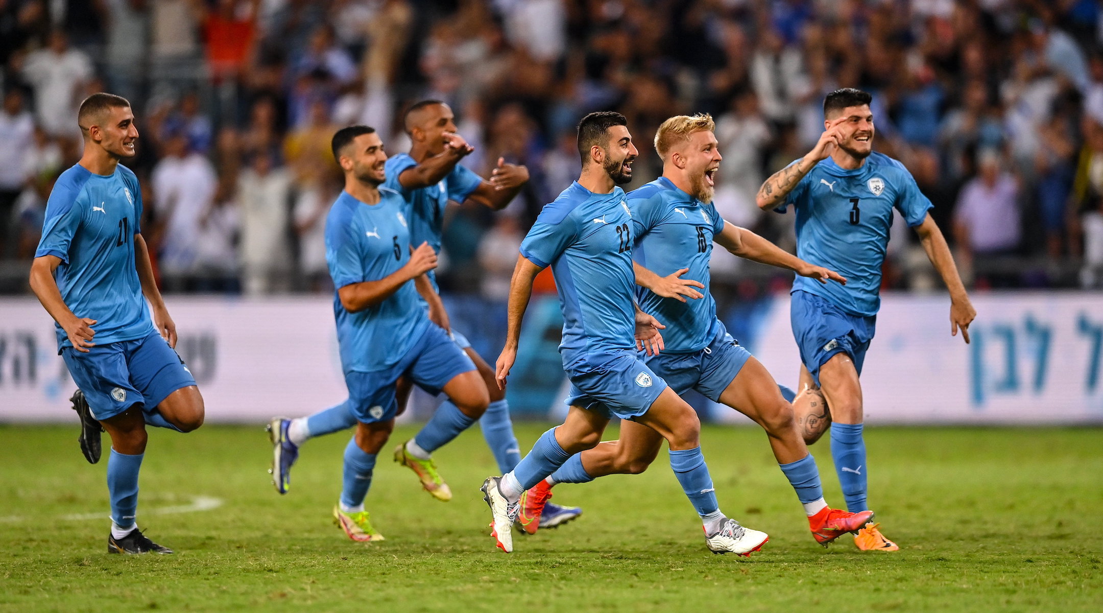 Israeli players on the country’s under-21 team celebrate a victory in the UEFA European U21 Championship playoff round against the Republic of Ireland at Bloomfield Stadium in Tel Aviv, Sept. 27, 2022. (Seb Daly/Sportsfile via Getty Images)