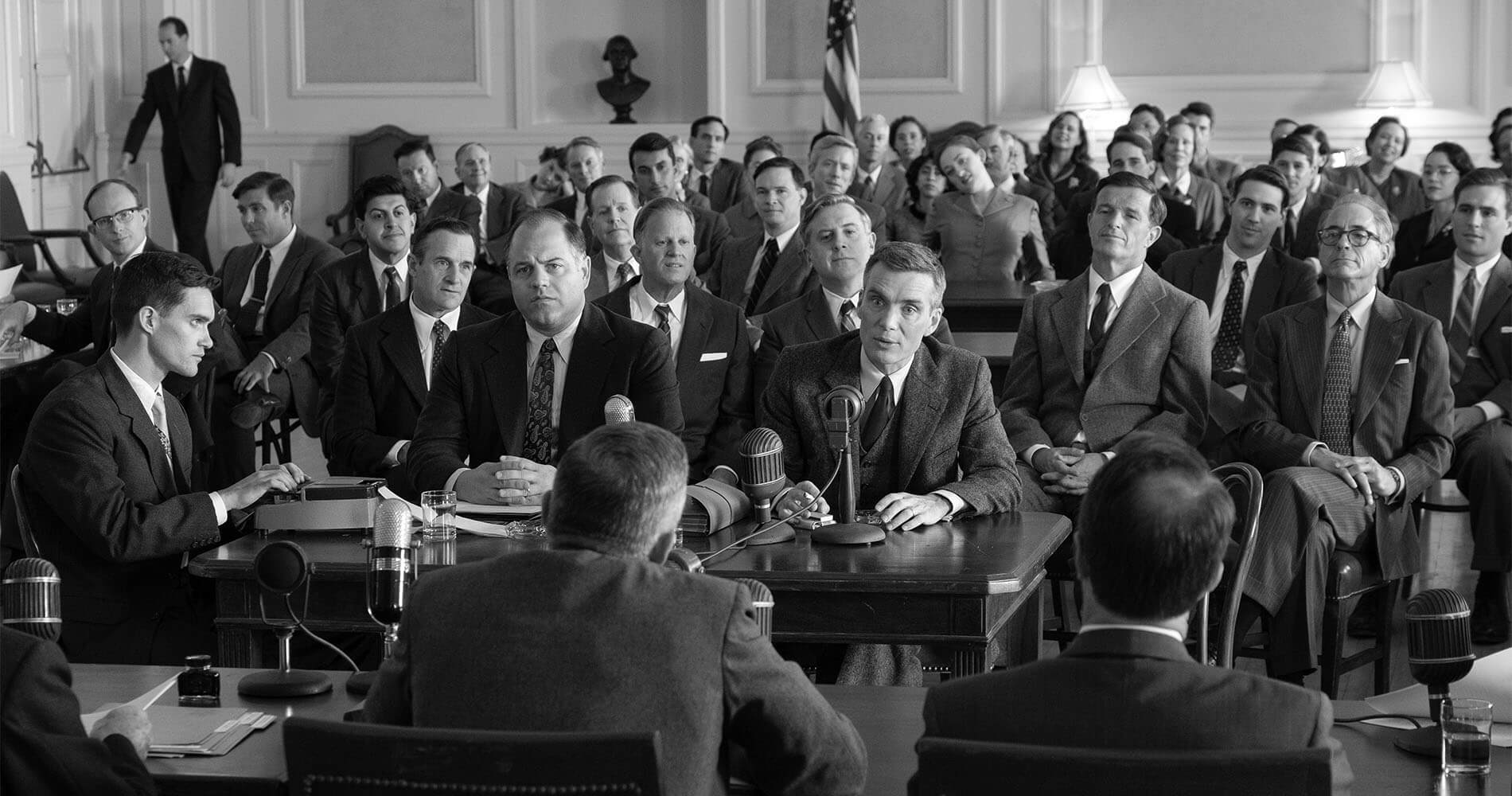 In a key scene in <i>Oppenheimer,</i> the physicist embarrasses Strauss before the Joint Committee on Atomic Energy, prompting Strauss' crusade to humiliate Oppenheimer.
