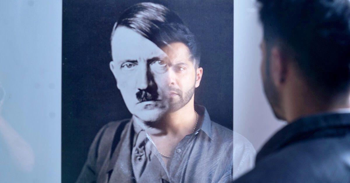 Ajay, played by Bollywood star Varun Dhawan, literally seeing himself in Hitler while at a Berlin museum.