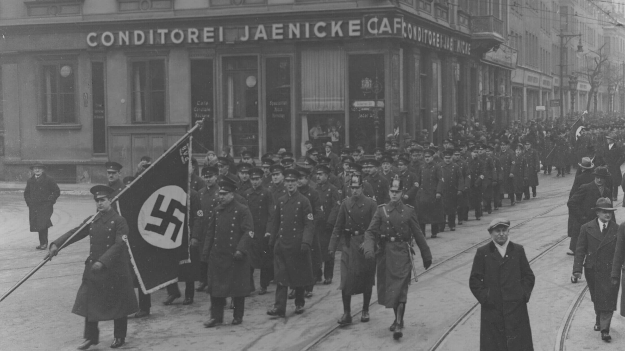 Nazi officials march through the streets of Berlin, 1944.