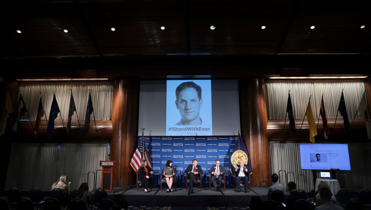 Panelists speak during a National Press Club event highlighting Wall Street Journal reporter Evan Gershkovich's extended detention.