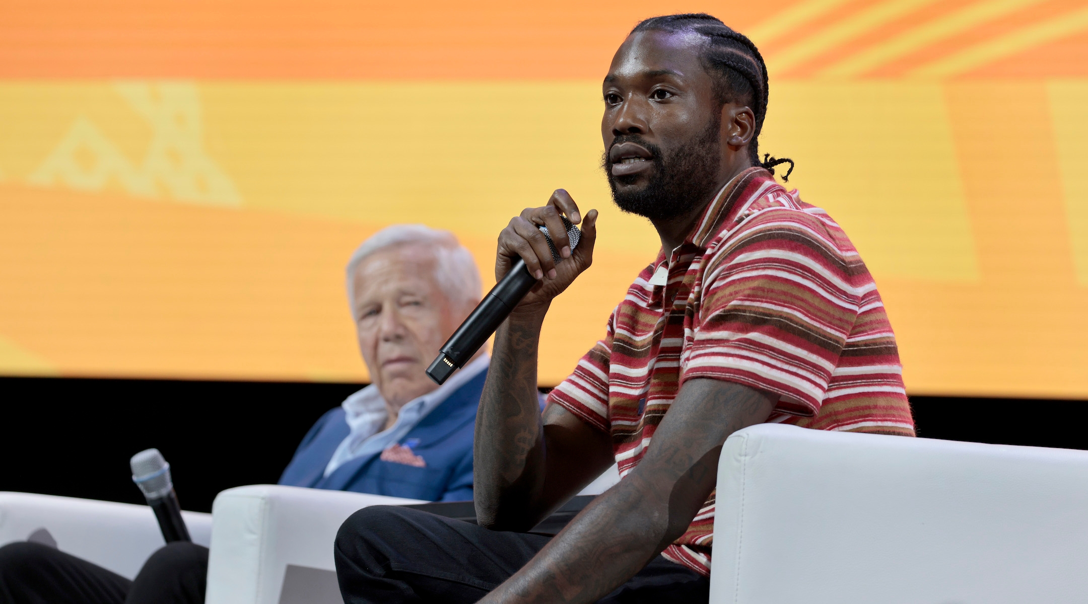 New England Patriots owner Robert Kraft, left, and rapper Meek Mill spoke on a panel about combating antisemitism and racism at the annual NAACP convention in Boston, July 30, 2023. (Pat Greenhouse/The Boston Globe via Getty Images)
