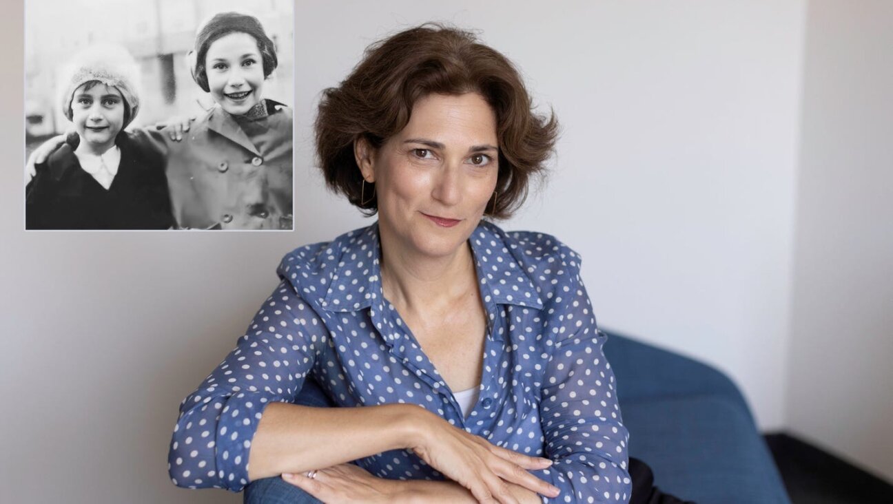 Author and journalist Dina Kraft, next to a photo of Hannah Goslar and Anne Frank.