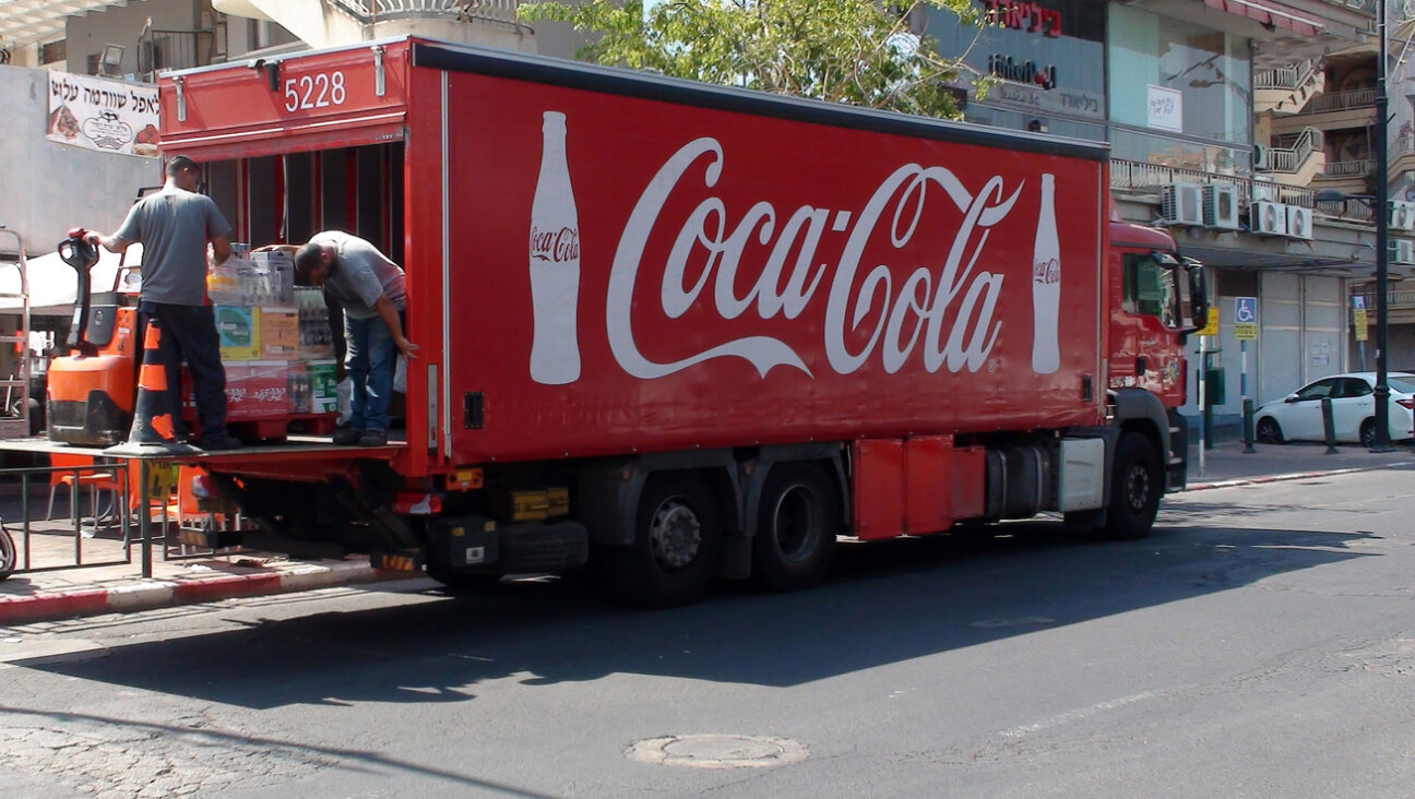 A Coca-Cola delivery truck in the Tiberias business district In Israel.