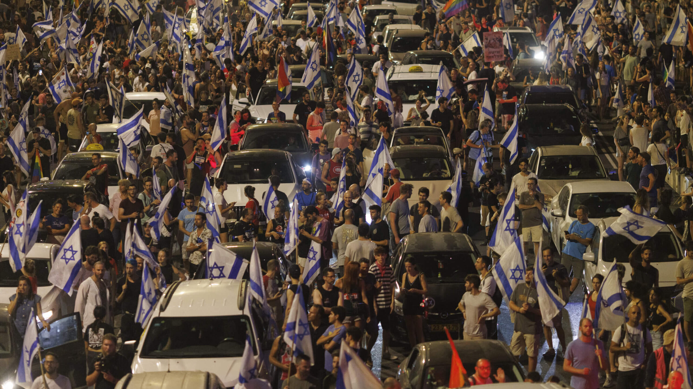 Protestors block a road during a demonstration against the judicial reform bill outside the Knesset, Israel's parliament, in Jerusalem, Israel, on Monday, July 24, 2023. Israel's parliament approved a bill that will reduce judges' ability to overrule government decisions and appointments. 