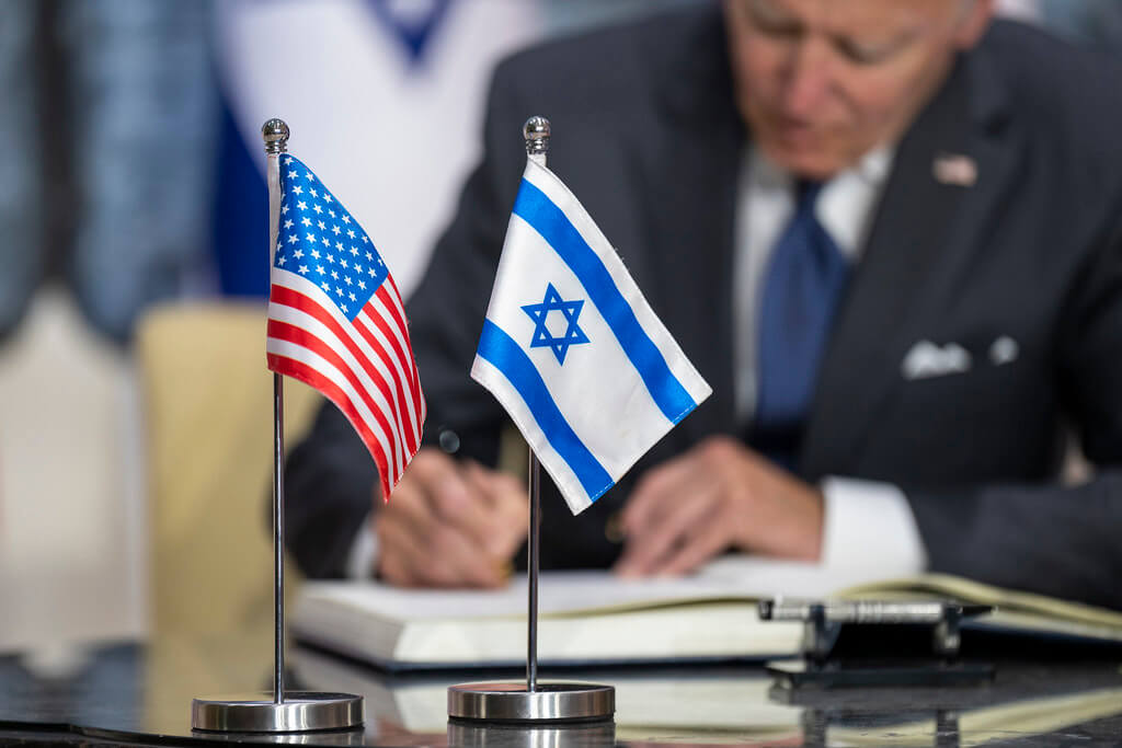 President Joe Biden signs the guestbook at the Israeli president’s residence in Jerusalem on July 14, 2022. 