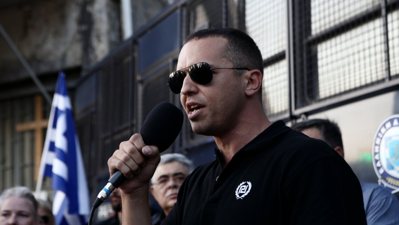 Then-Golden Dawn lawmaker Ilias Kasidiaris speaks during a rally against the construction of a mosque in central Athens, Sept. 5, 2018. (Panayotis Tzamaros/NurPhoto/Getty Images)