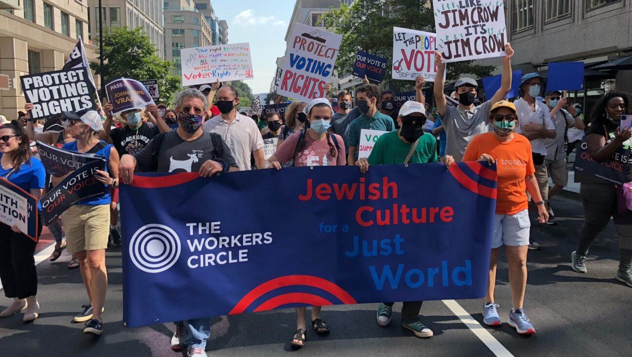 Members of The Workers Circle at a pro-democracy march. The group has announced it will resign from the Conference of Presidents of Major American Jewish Organizations due to what it described as the coalition’s inaction on protecting democracy. (Courtesy of The Workers Circle)