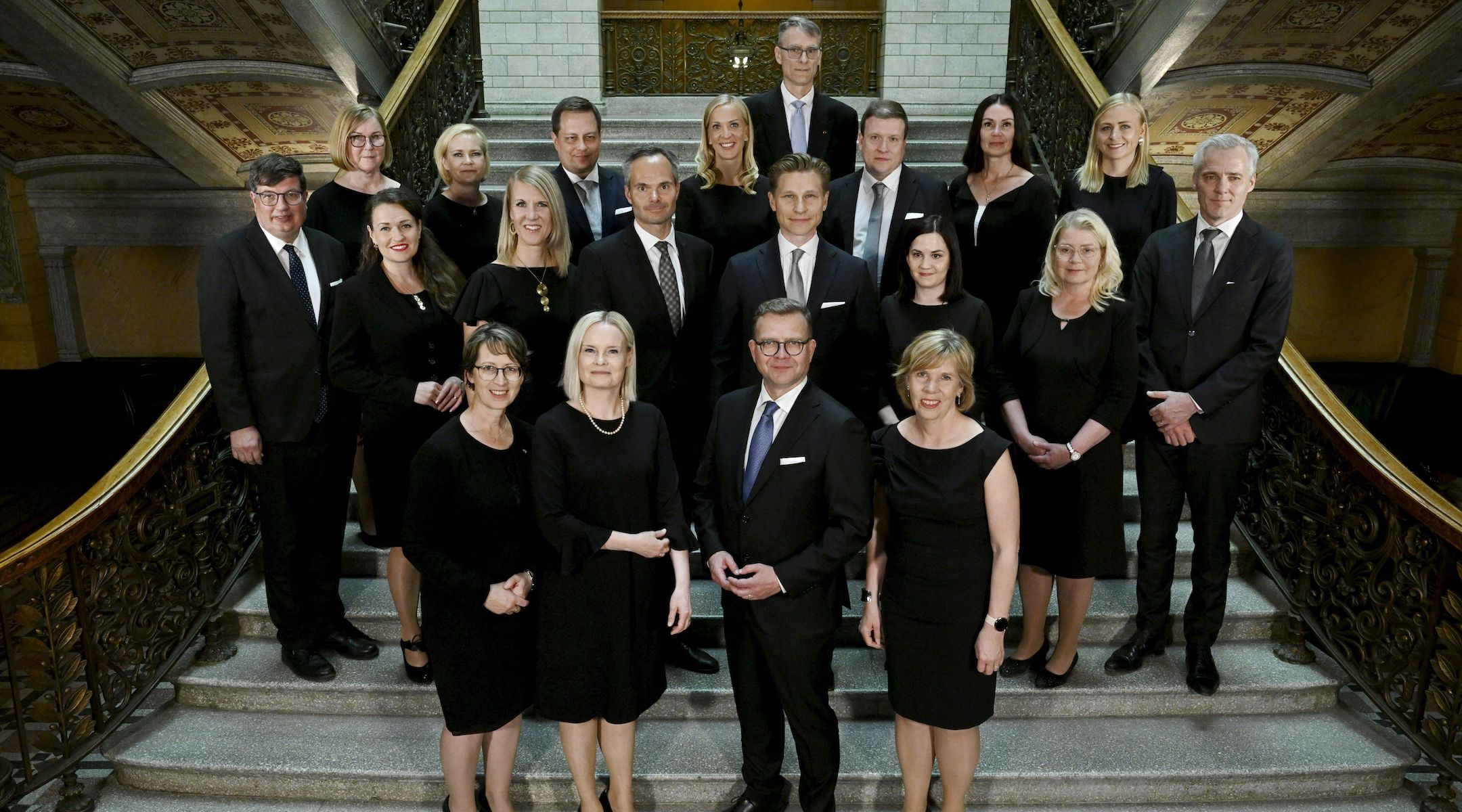 The new government of Finland led by Prime Minister Petteri Orpo (front row center) poses for a family photo in Helsinki, Finland, June 20, 2023. Former minister of economic affairs Vilhelm Junnila (third row, third from left) resigned after 10 days on the job over Nazi jokes he made in 2019. (Antti Aimo-Koivisto / Lehtikuva / AFP via Getty Images)