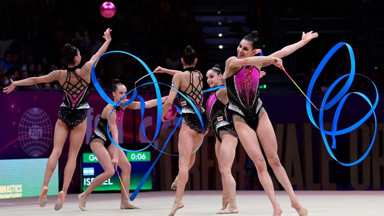 Israeli gymnasts compete at the Rhythmic Gymnastics World Championships in Valencia, Spain, Aug. 27, 2023. (Jose Jordan/AFP via Getty Images)