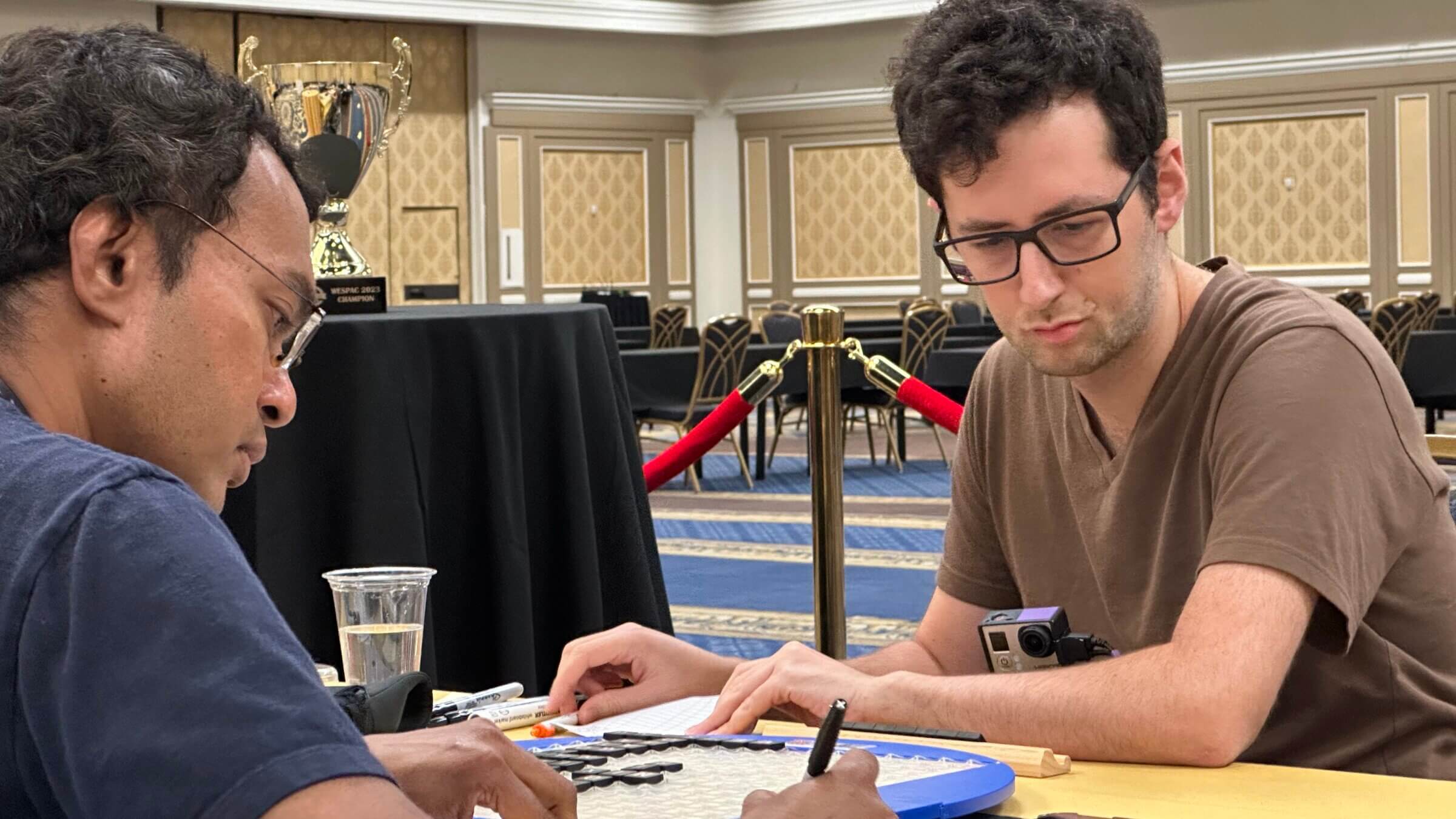David Eldar, right, during the 2023 Scrabble championship tournament. He defeated Harshan Lamabadusuriya, left, to win the tournament.