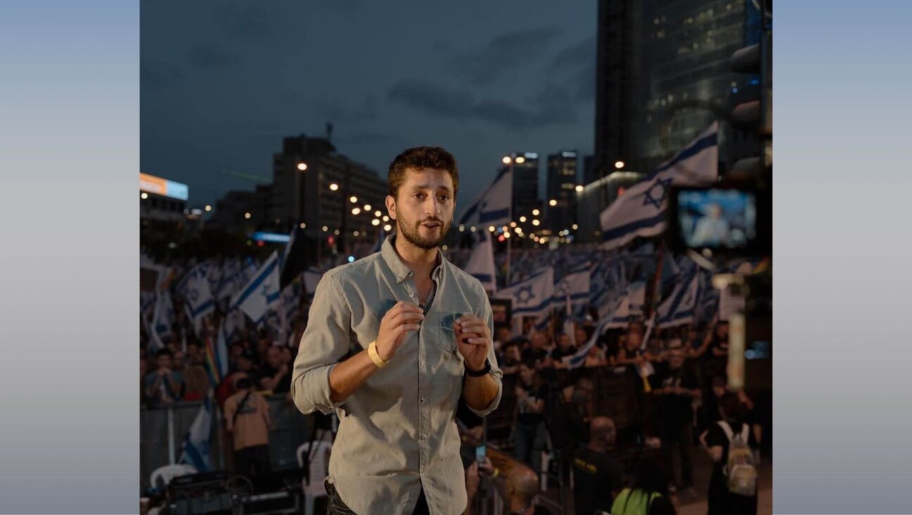 The author addressing media at a pro-democracy demonstration in Tel Aviv, June 3, 2023. 