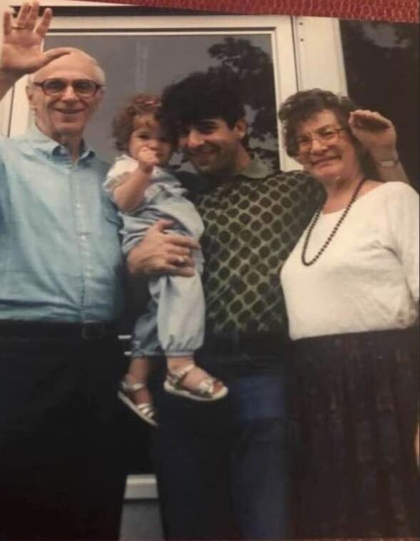 The author Emily Tamkin (center left) with her grandfather, father, and grandmother