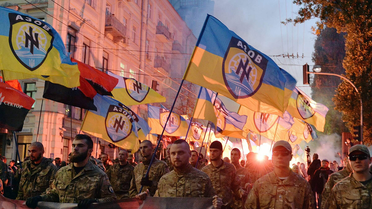 Ukrainian members of the Azov battalion demonstrate in Kyiv in 2014. The unit has garnered praise for its military heroics, but questions linger about its extremist past. (Getty)