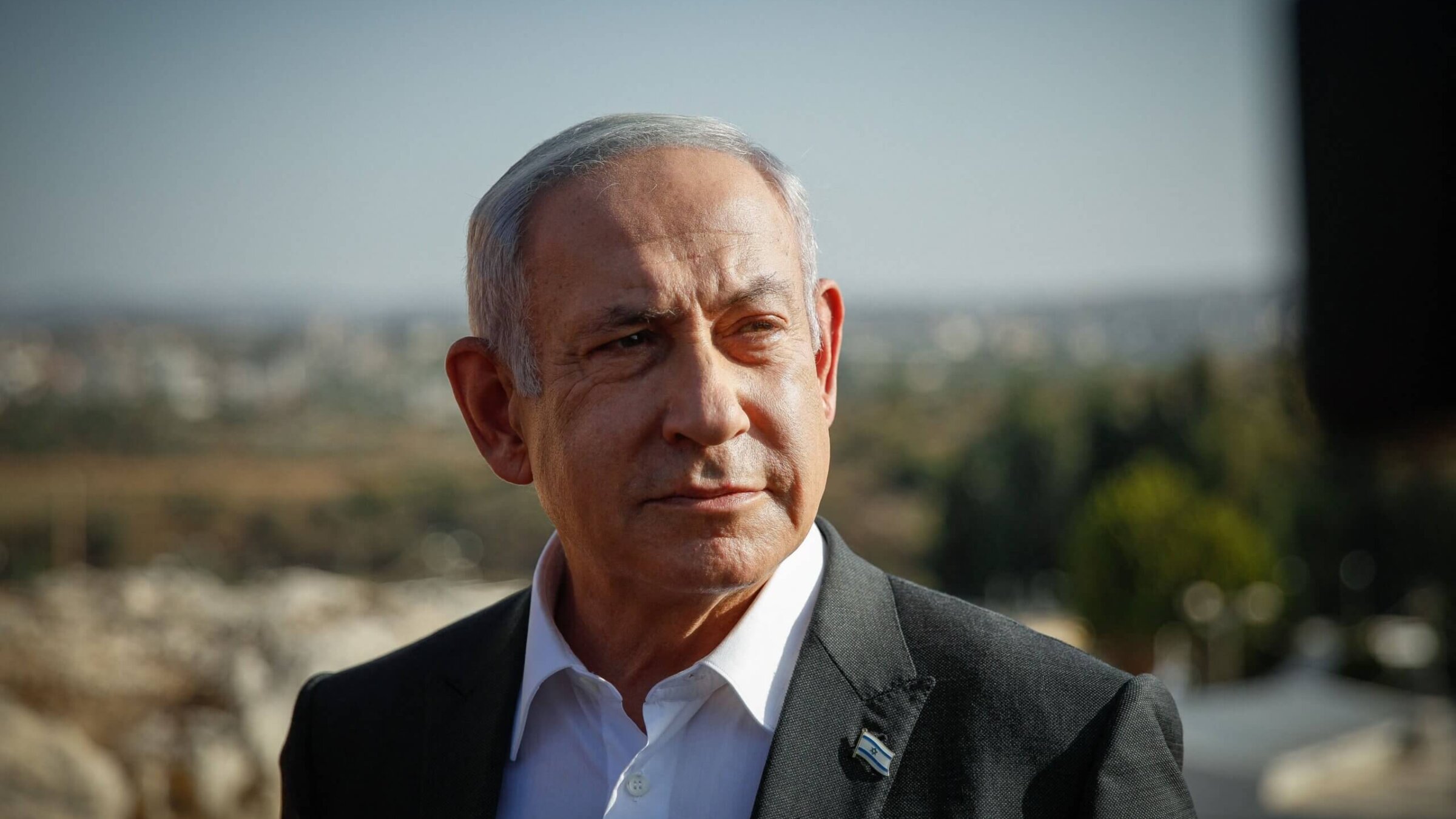 Israeli Prime Minister Benjamin Netanyahu arrives for a briefing near the Salem military post in the occupied West Bank on July 4, 2023. 