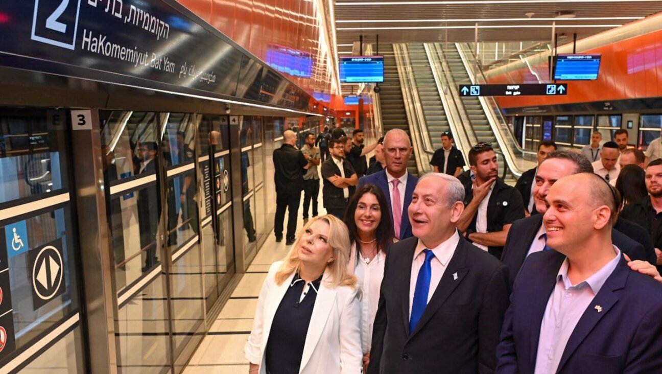Prime Minister Benjamin Netanyahu and his wife, Sara, at the opening of the light rail station in Tel Aviv.
