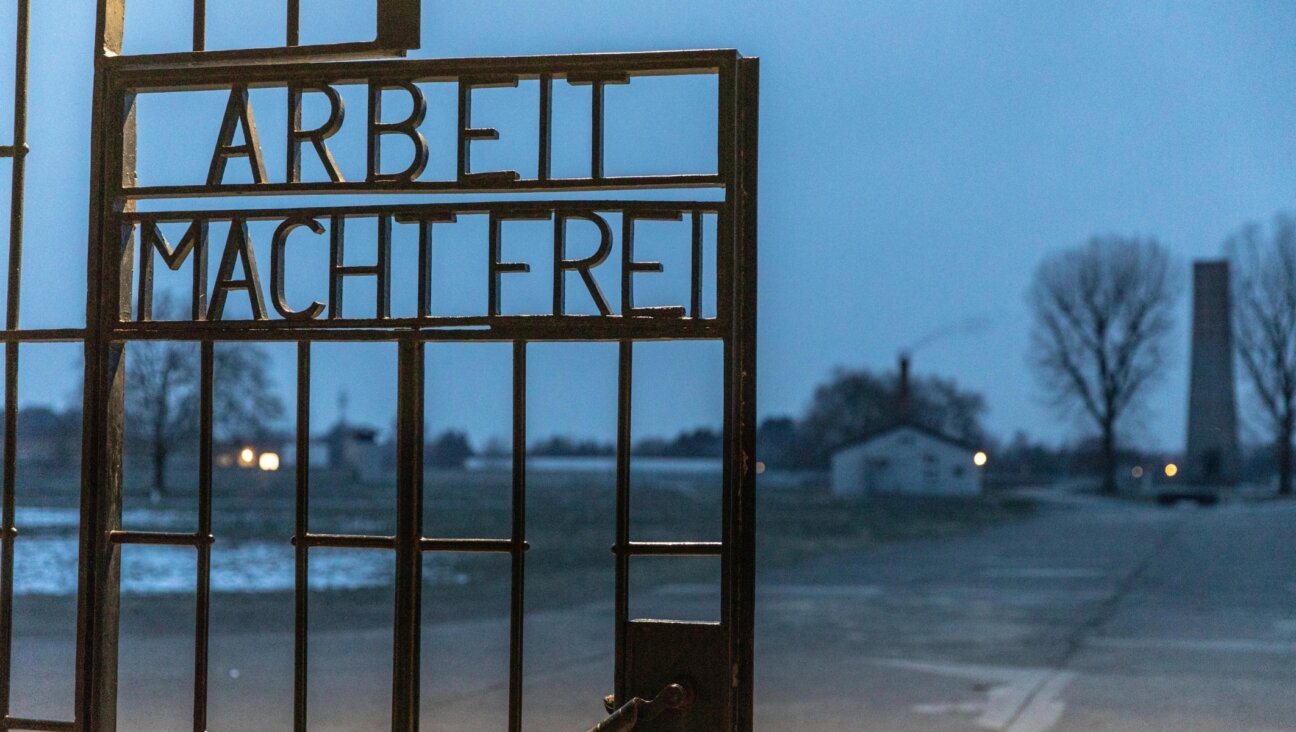 A gate with the inscription “Work Sets You Free” at the Sachsenhausen concentration camp memorial in Oranienburg, Germany, Jan. 25, 2019. (Omer Messinger/Getty Images)