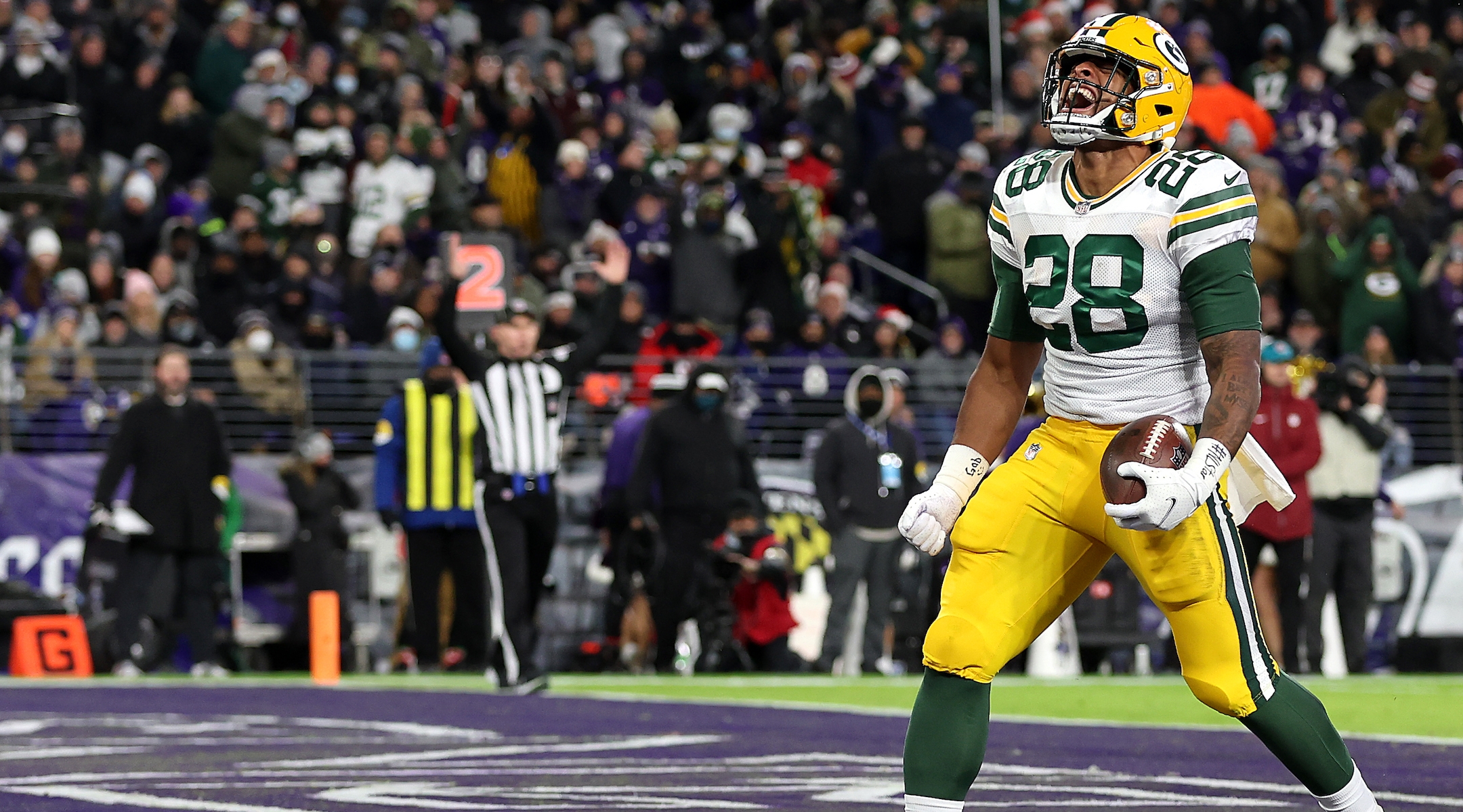 Running back A.J. Dillon of the Green Bay Packers celebrates after rushing for a first half touchdown against the Baltimore Ravens at M&T Bank Stadium in Baltimore, Dec. 19, 2021. (Rob Carr/Getty Images)