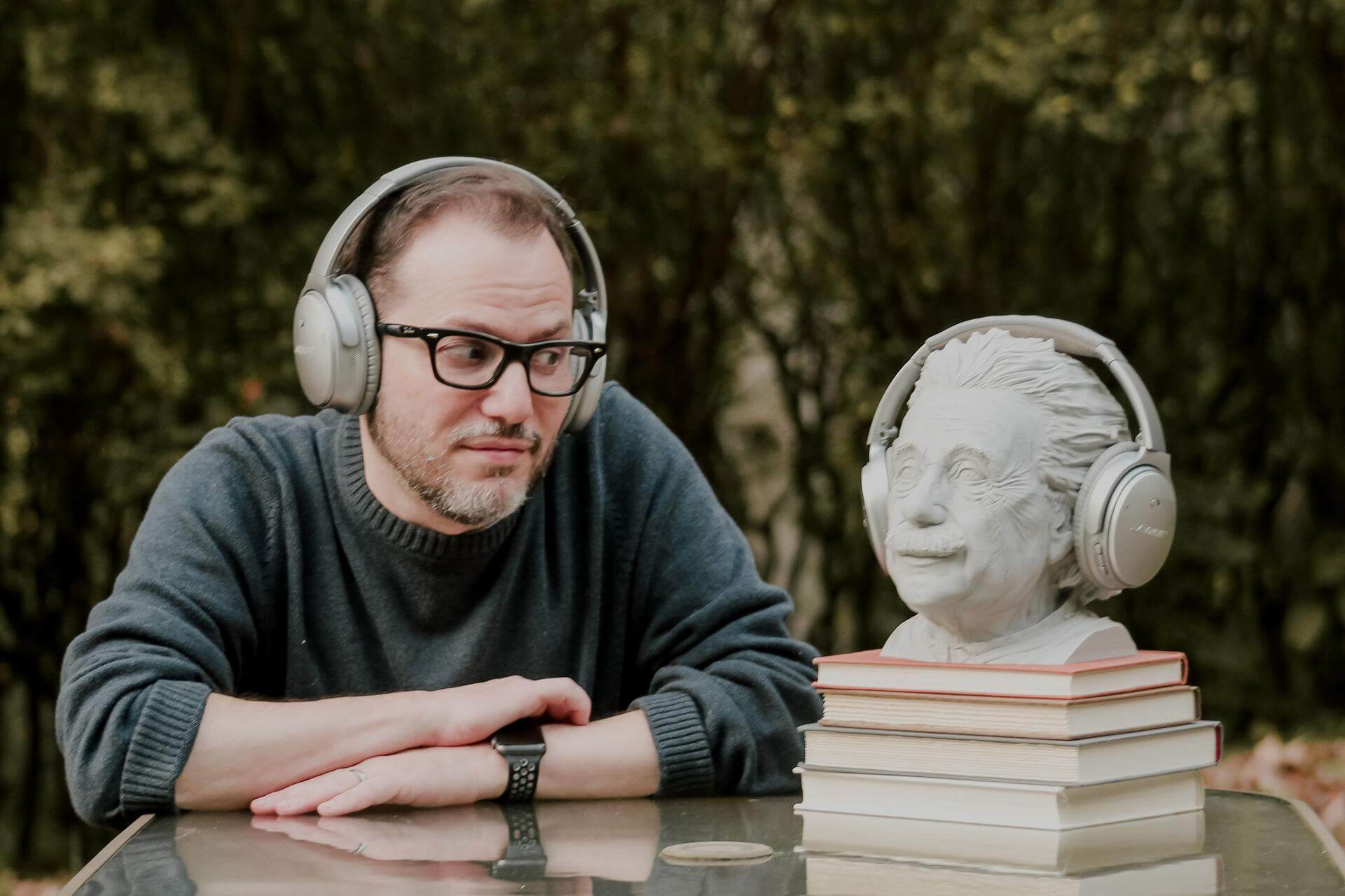 This photo is posed (duh), but Benyamin really does use that Einstein bust to hold extra headphones in his home office in Morgantown, West Virginia. He also has the two authorized Einstein bobbleheads and a 578-page paperback called The Ultimate Quotable Einstein at the ready near his desk. (Photo by Shoshi Benstein)