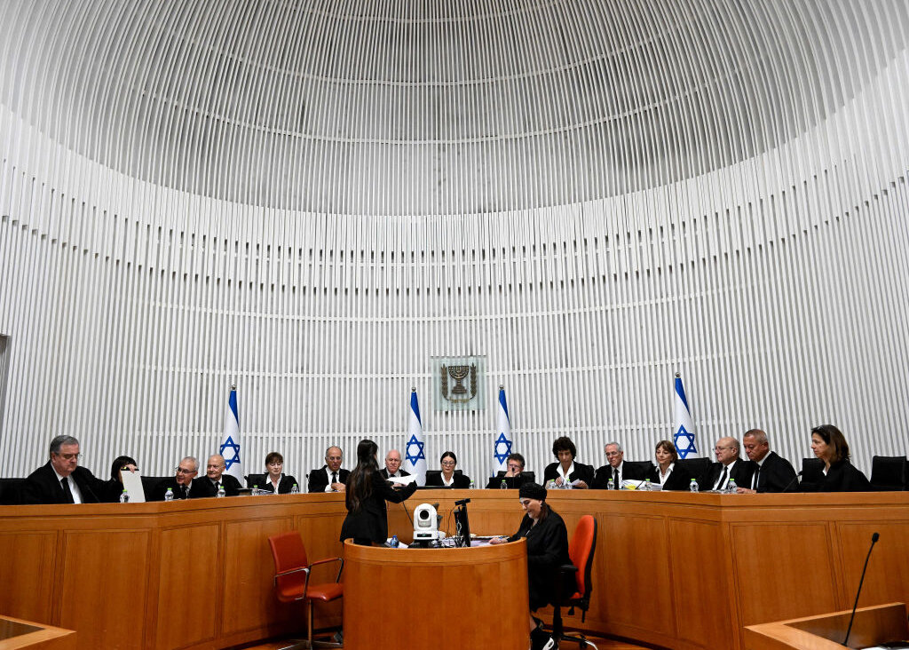 President of the Israeli Supreme Court Esther Hayut and all fifteen judges assemble to hear petitions against the 'reasonableness clause' of the judicial overhaul at the court in Jerusalem, on September 12, 2023. 