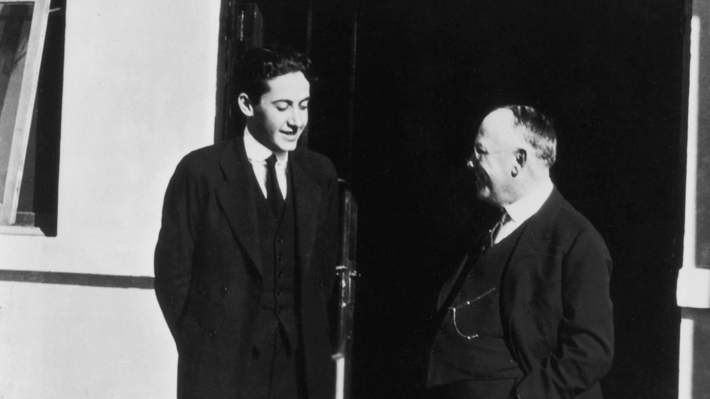 American film producer Irving Thalberg, the child of German Jews (left), speaks with Jewish, German-born film executive Carl Laemmle (right) on the lot of Universal Studios.