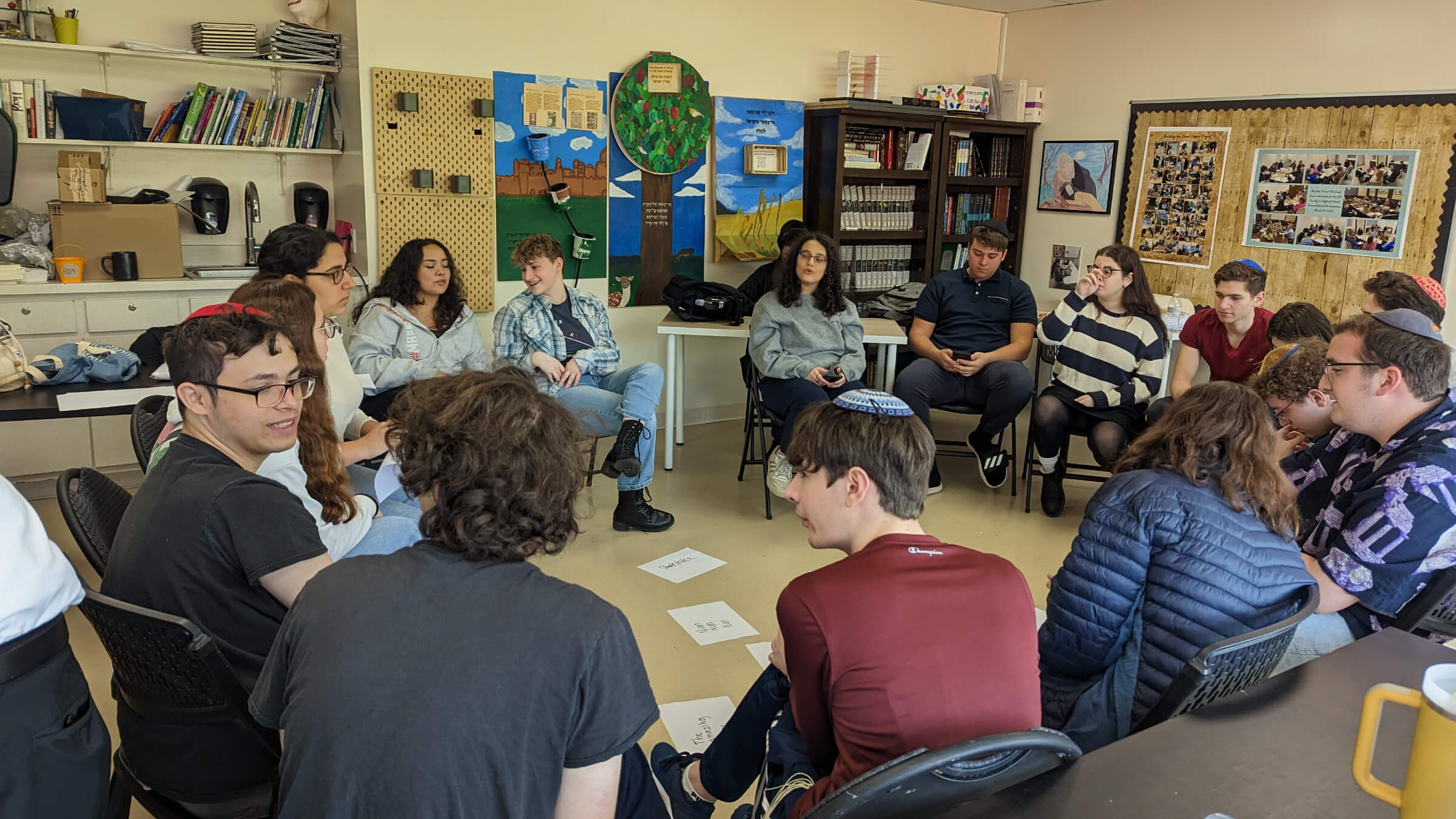 Idea School seniors meet with two visiting teens from Israel at the school this spring during Hebrew class.