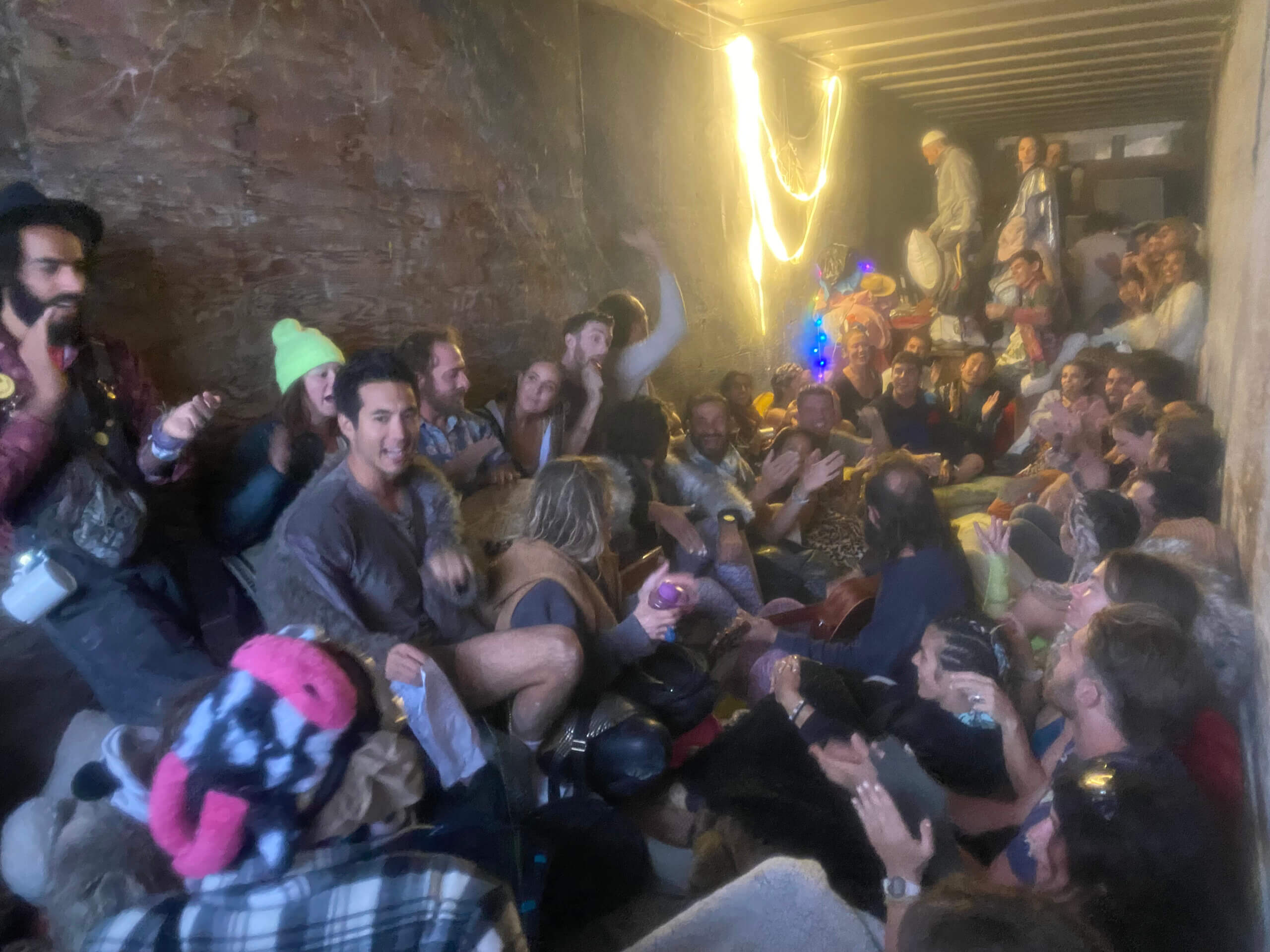 The scene inside Milk + Honey's shipping container as Kabbalat Shabbat services at Burning Man began Friday night.