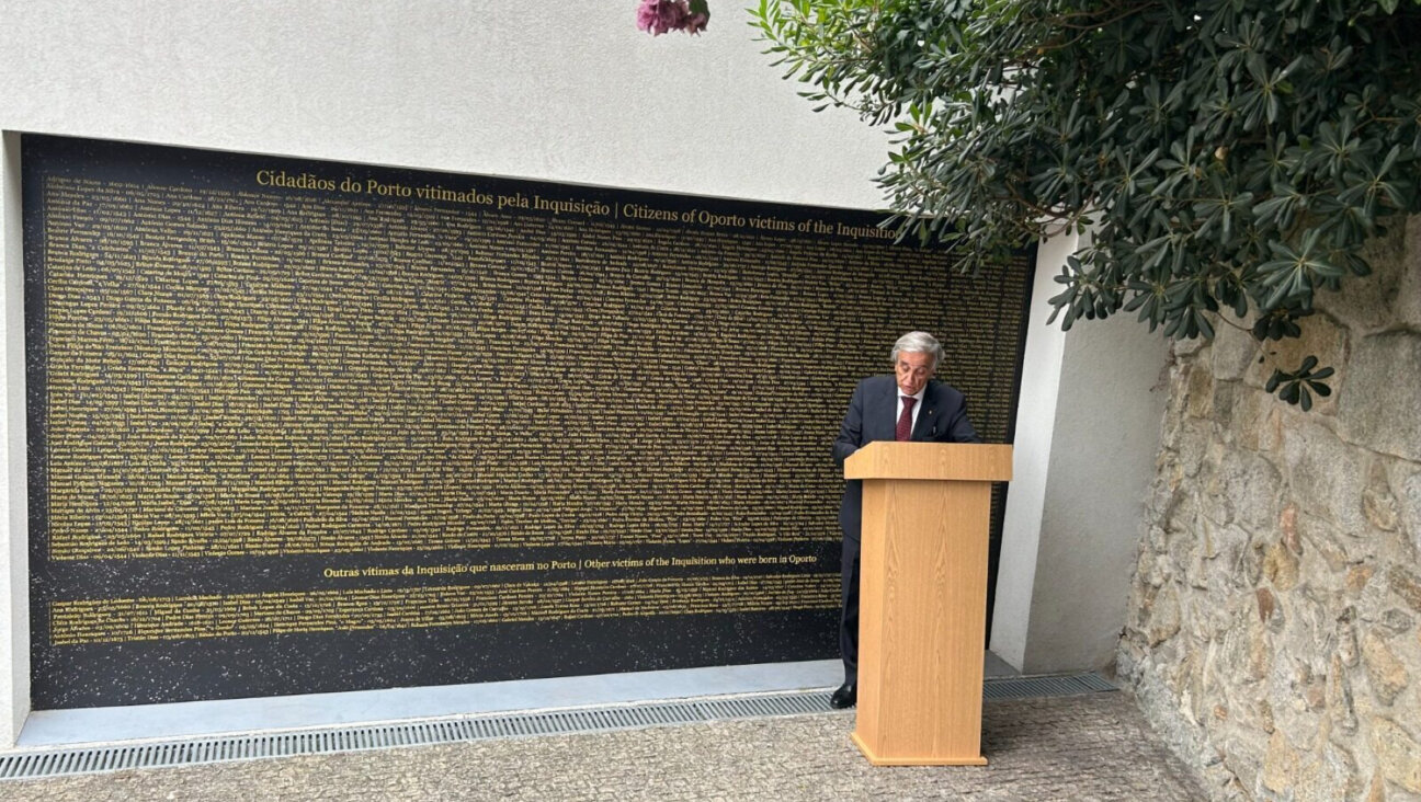 Sebastião Feio, president of the Porto municipal general assembly, speaks at a ceremony dedicating the Portuguese city's memorial to the local victims of the Inquisition, Sept. 3, 2023.