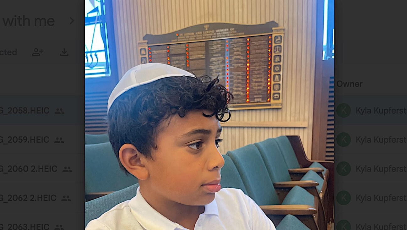 10-year old Naftali at Temple Beth Abraham in Oakland, CA before the Kol Nidrei service