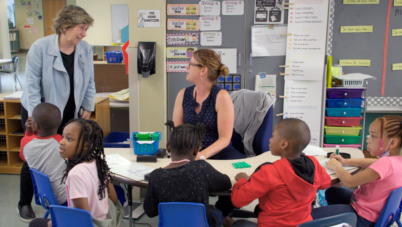 Weingarten, left, visits educators and students at Makowski Early Childhood Center in
Buffalo, N.Y., on June 2, 2022.